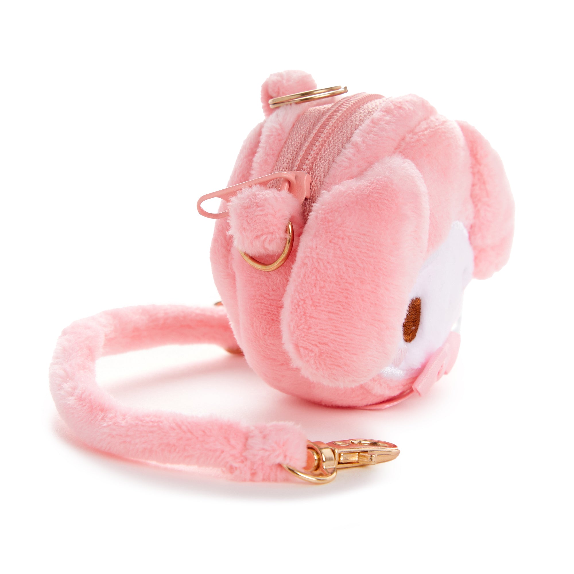 Front view of the plush pouch attached to a tote bag as a cute accessory