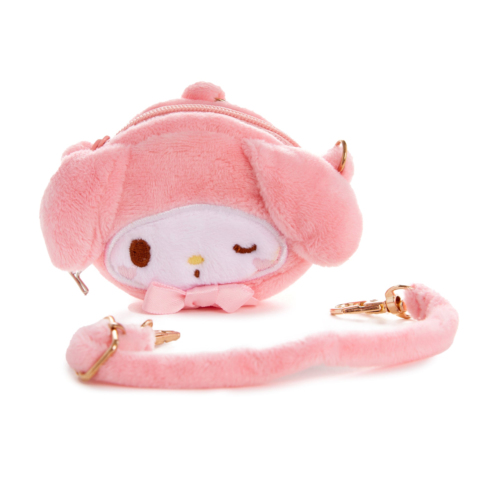 Front view of the plush pouch attached to a tote bag as a cute accessory