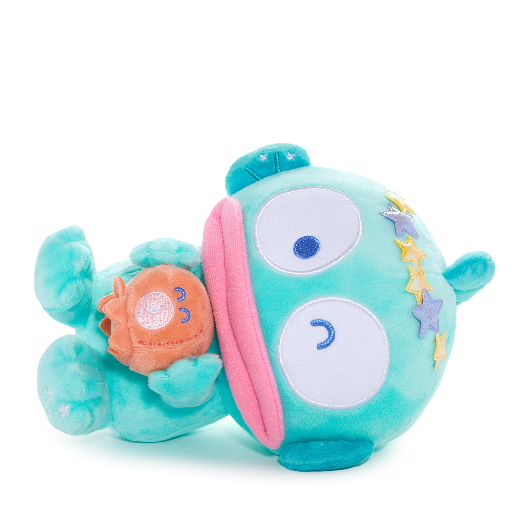 Front view of the Hangyodon plush toy with star details.