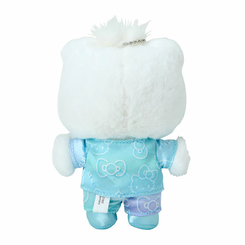 Side view showing push clasp and detailed bow appliques on plush hello kitty keychain.