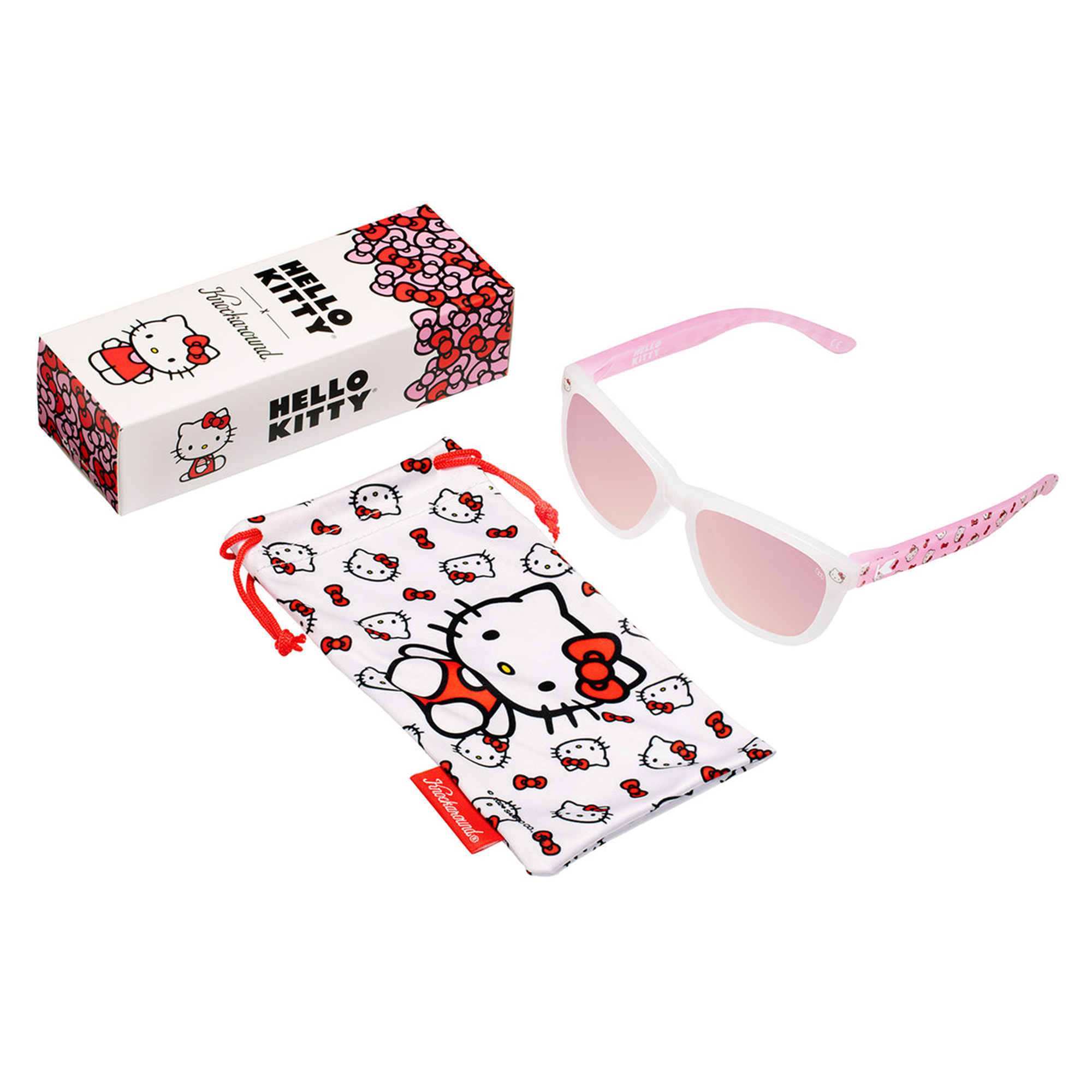 Child wearing Hello Kitty in sunglasses outdoors.