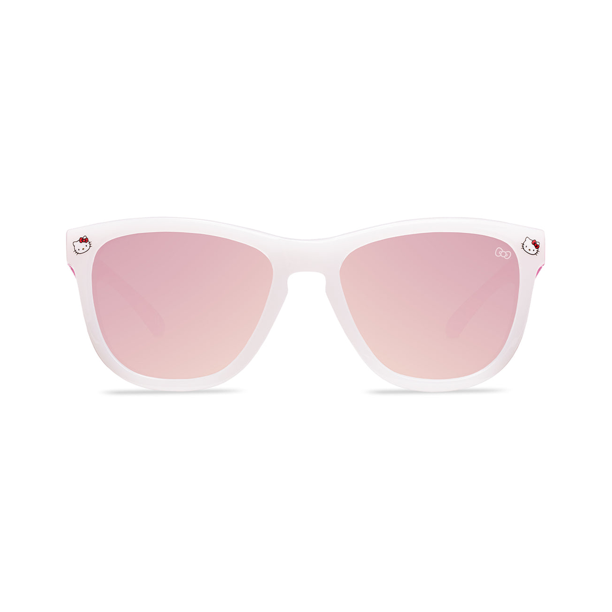 Child wearing Hello Kitty in sunglasses outdoors.