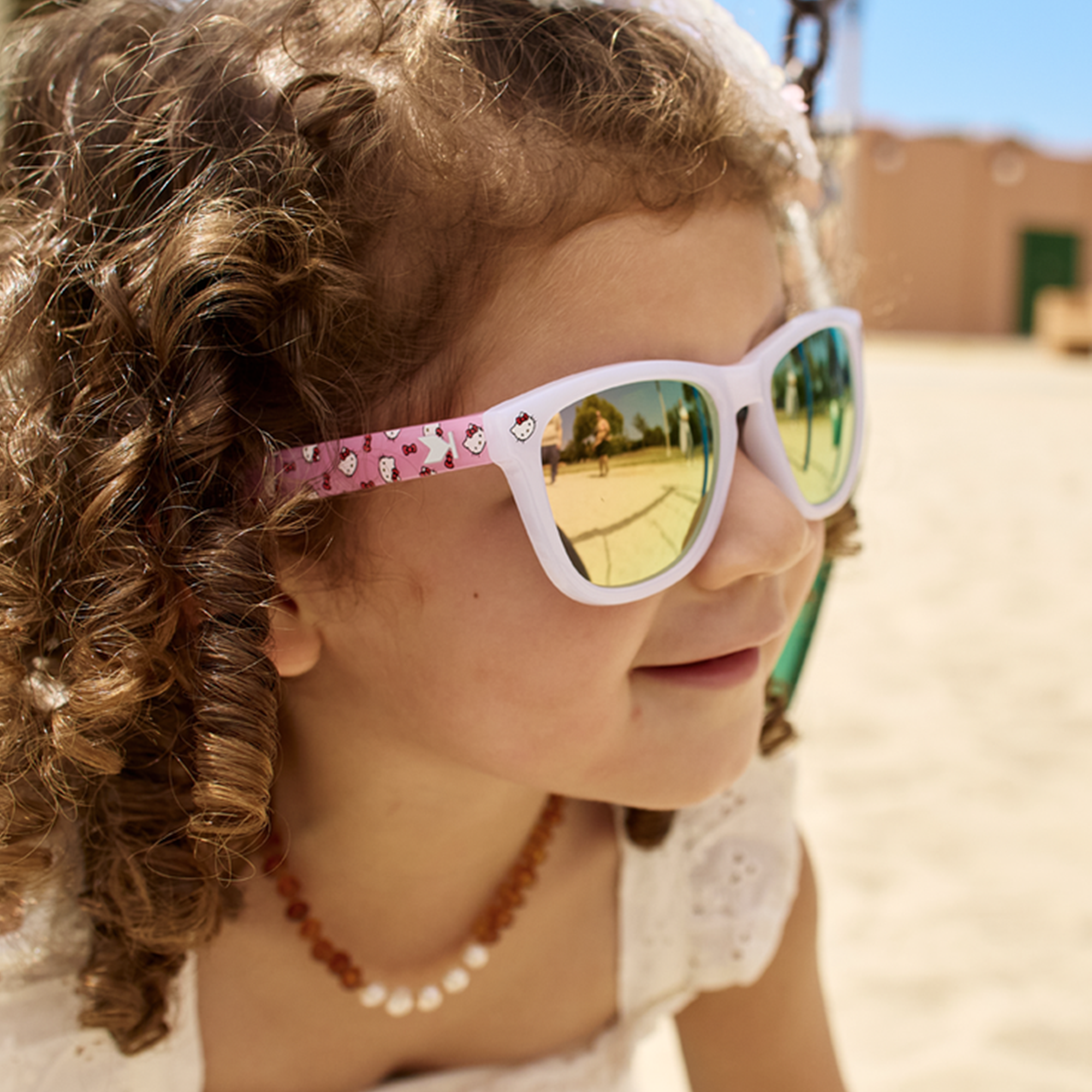 Side view of Knockaround Kids Premiums showing Hello Kitty print on arms.
