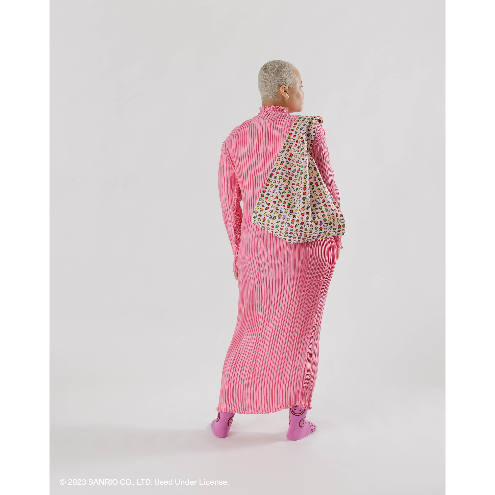 Close-up of the Hello Kitty duffle bag showing its spacious interior and sturdy handles
