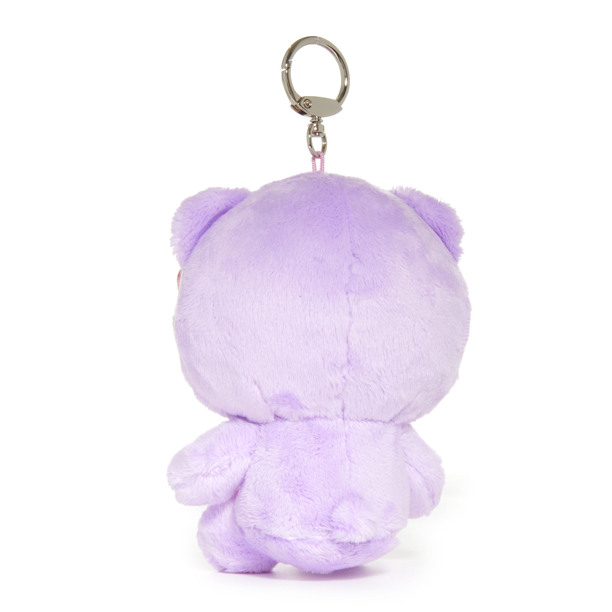 Hello Kitty mascot keychain attached to a backpack zipper, showcasing the sparkling crystal accents