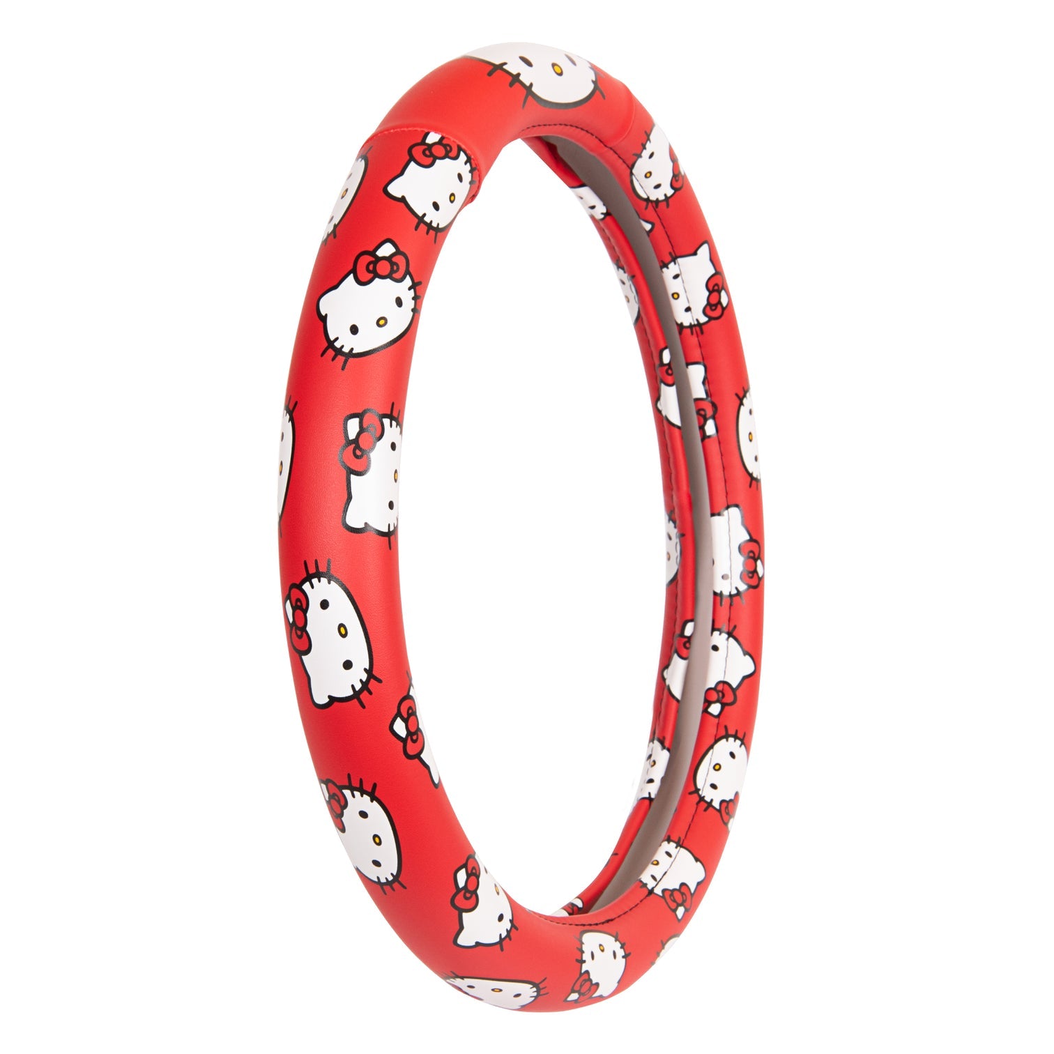 Detailed view of the classic red Hello Kitty steering wheel cover.