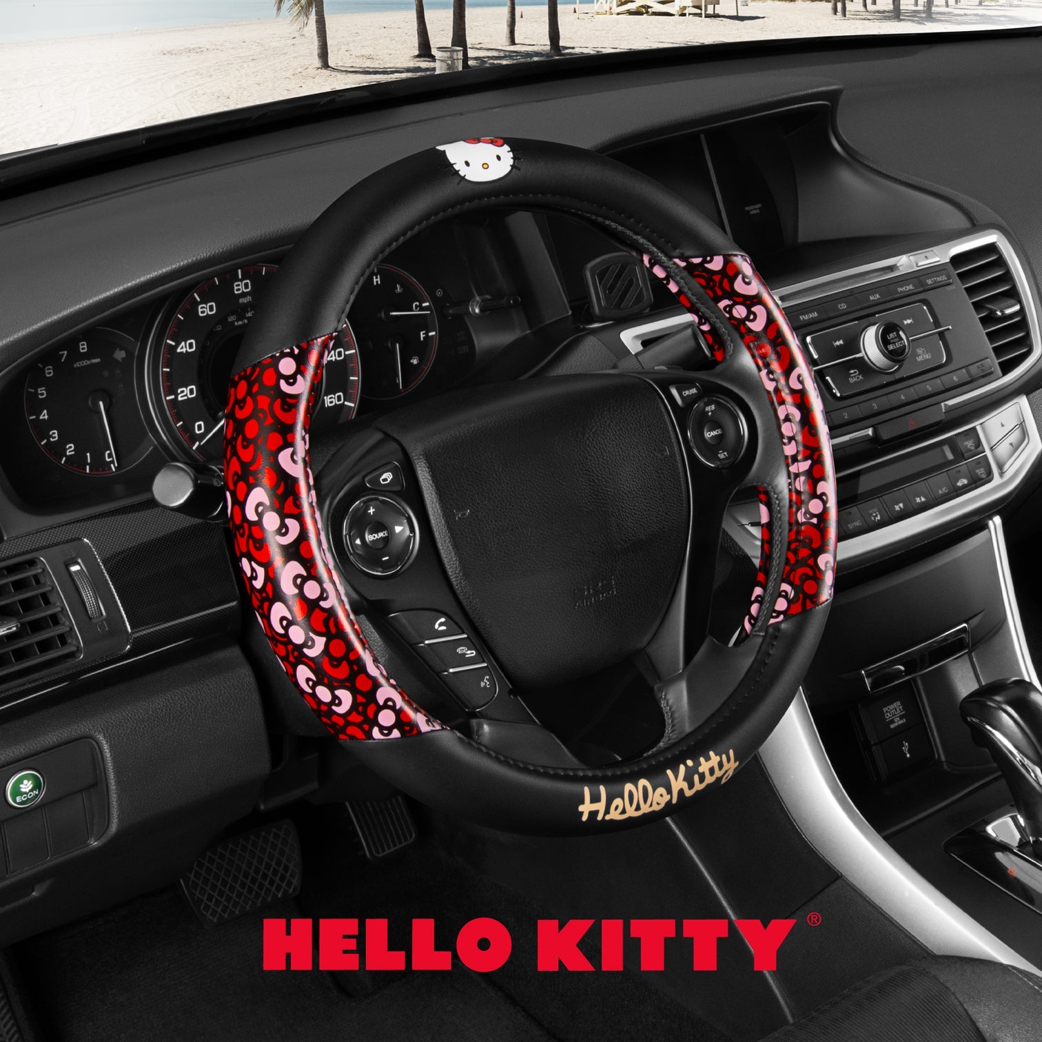 Close-up of red bow detail on Hello Kitty steering wheel cover