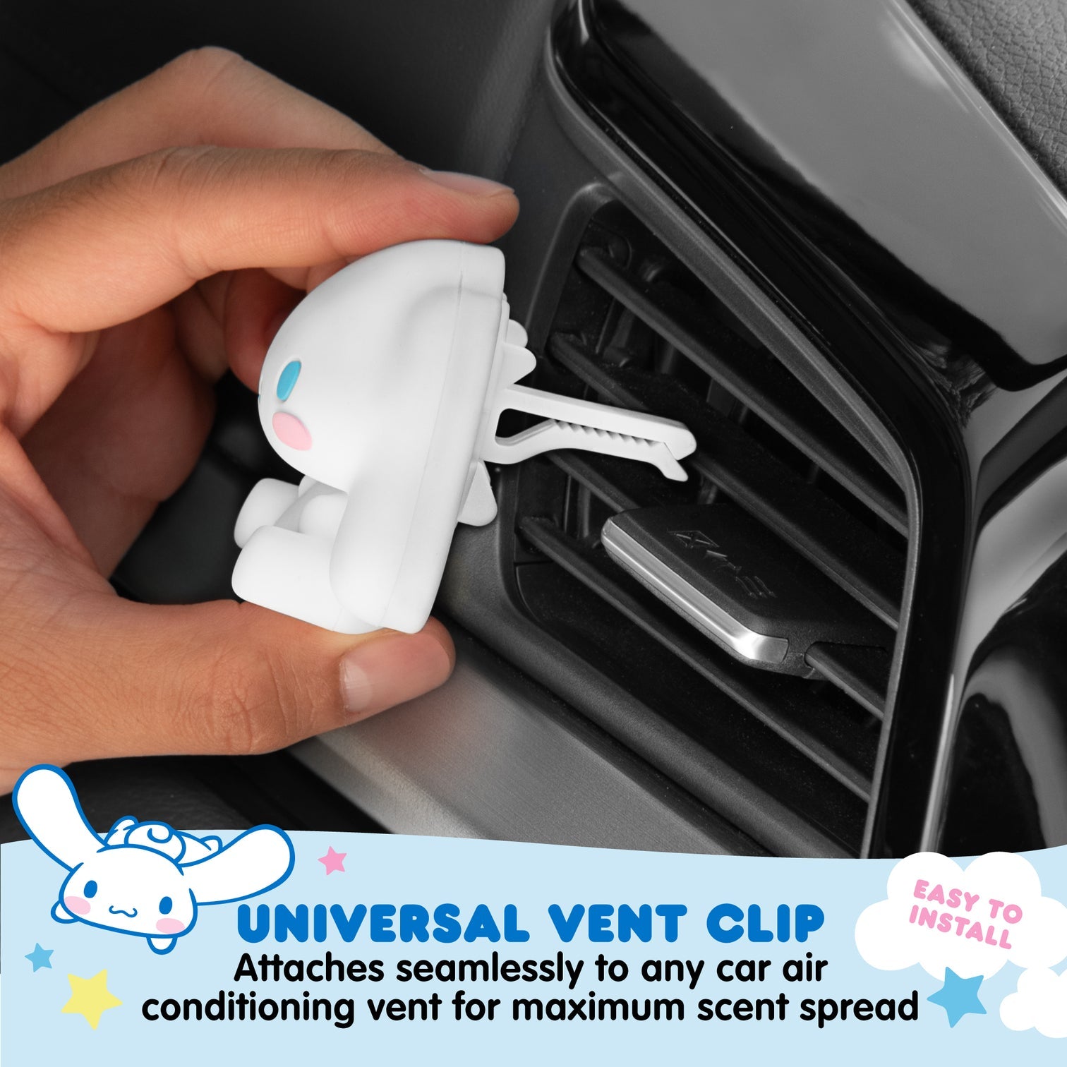 Close-up of Cinnamoroll air freshener clipped to a car vent, cotton-scented pod visible
