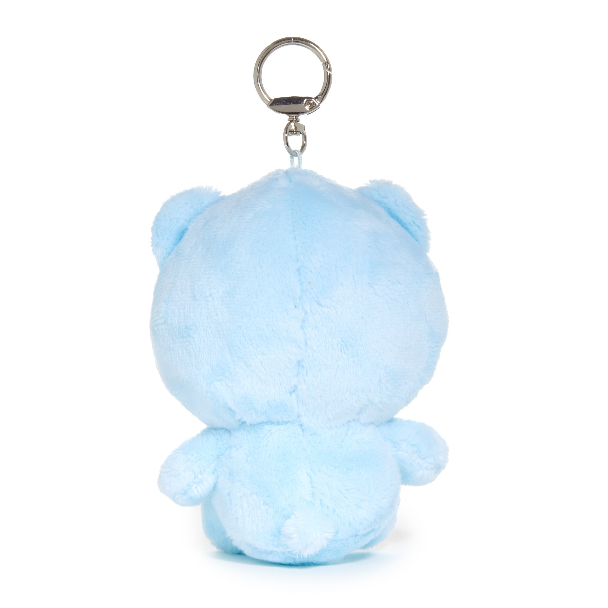 Close-up of the Hello Kitty keychain featuring embroidered details and aquamarine birthstone