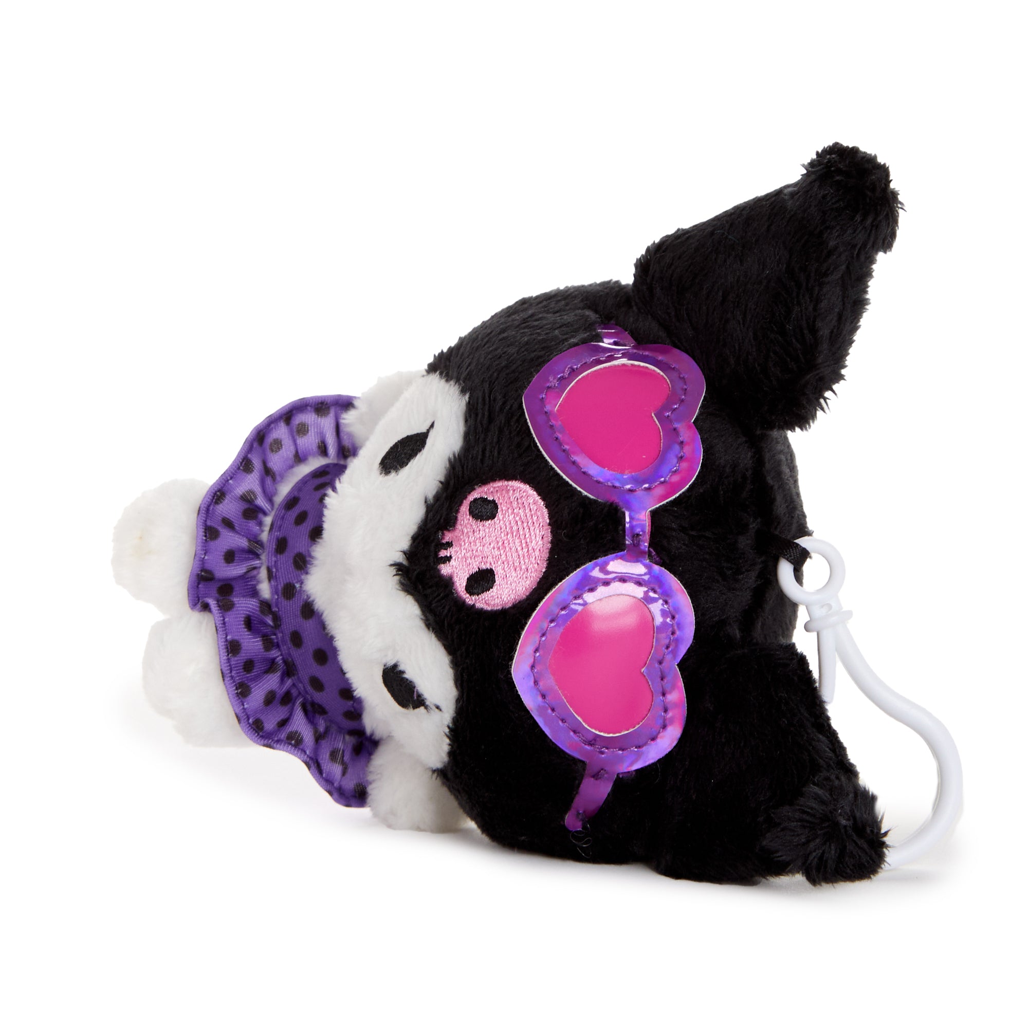 Kuromi plush charm clipped onto beach tote, great companion for pool days.