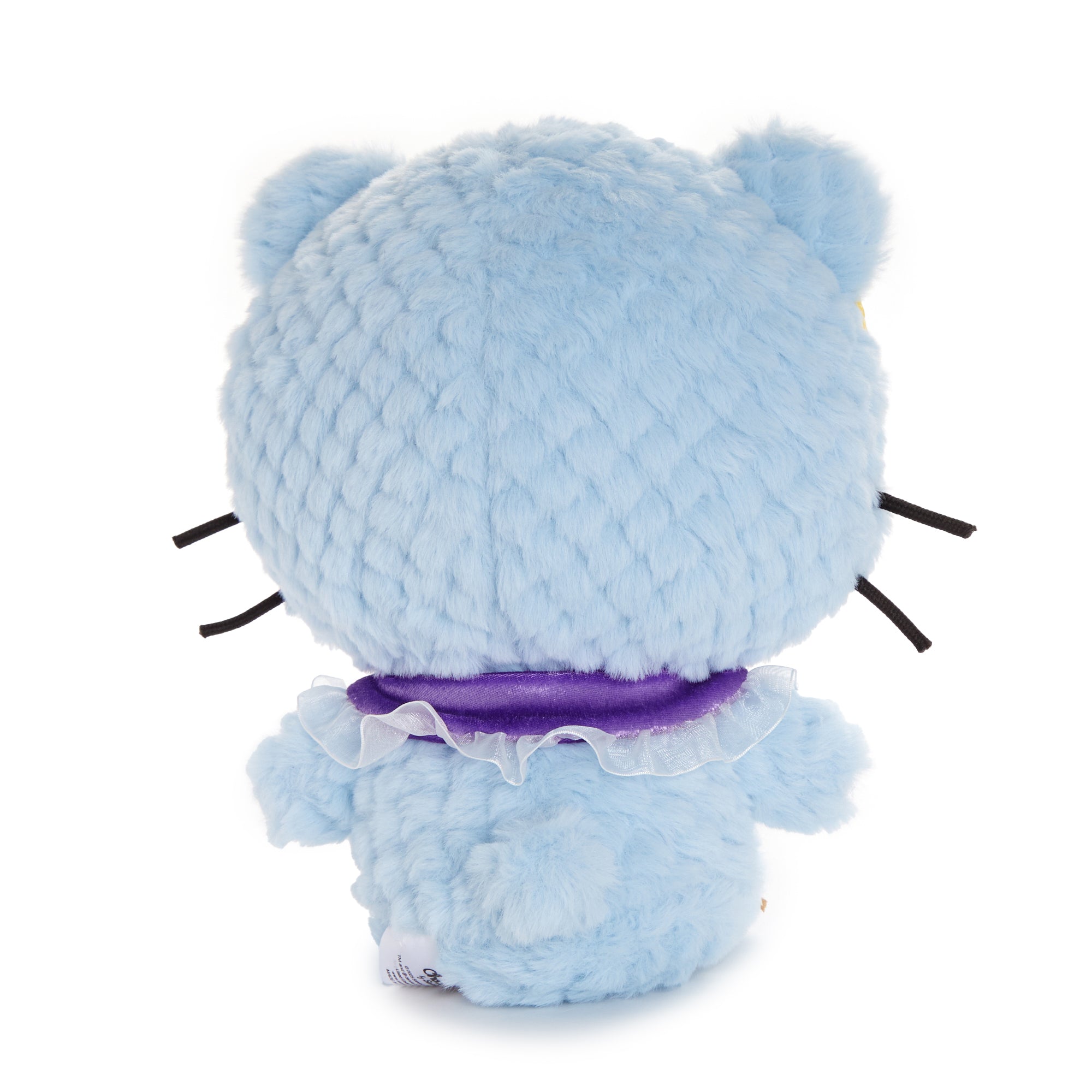Close-up of Chococat plush showing ruffled collar and ribbons.