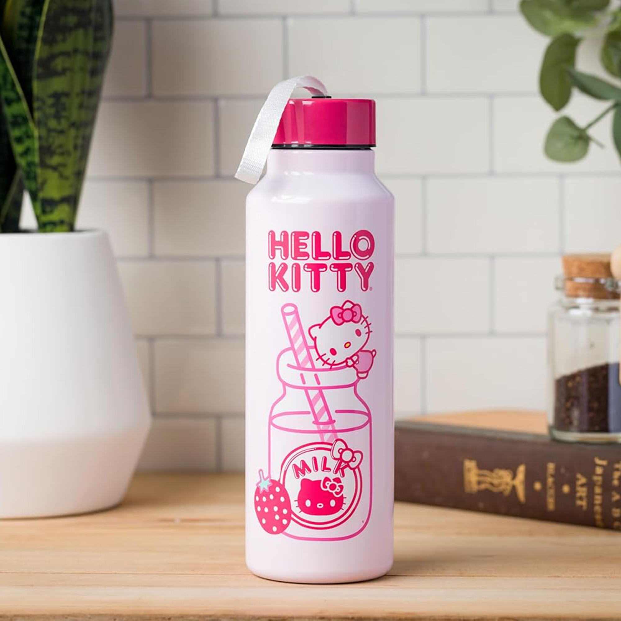 Close-up of the stainless steel water bottle with straw