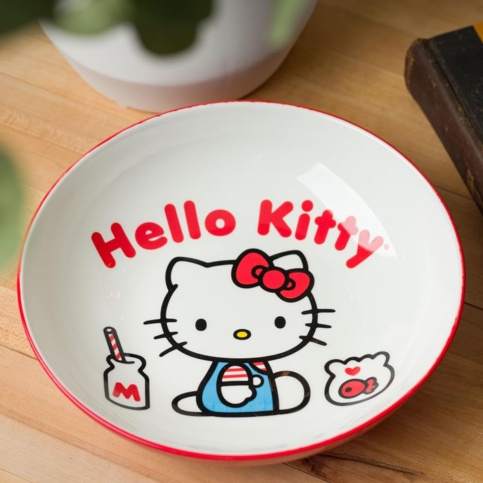 Close-up of milk bottle graphic on ceramic bowl