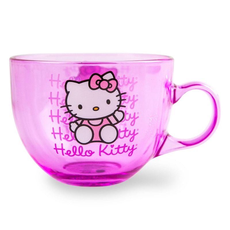 Front-facing shot of the hello kitty mug on a countertop with a latte inside.