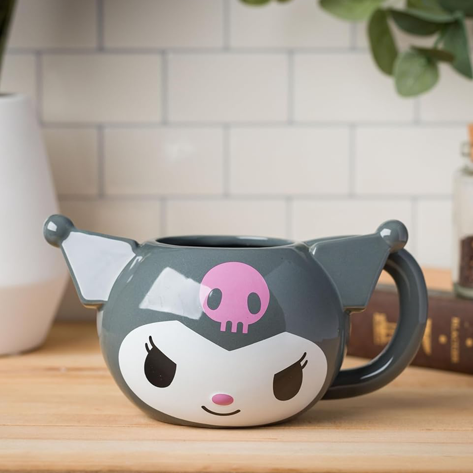 Side view of the gray Kuromi coffee mug filled with hot cocoa.