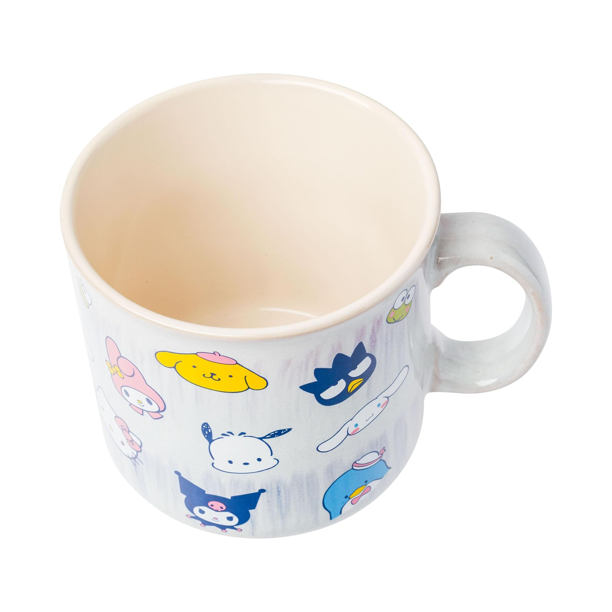 A cozy morning scene with the Hello Kitty mug filled with hot beverage