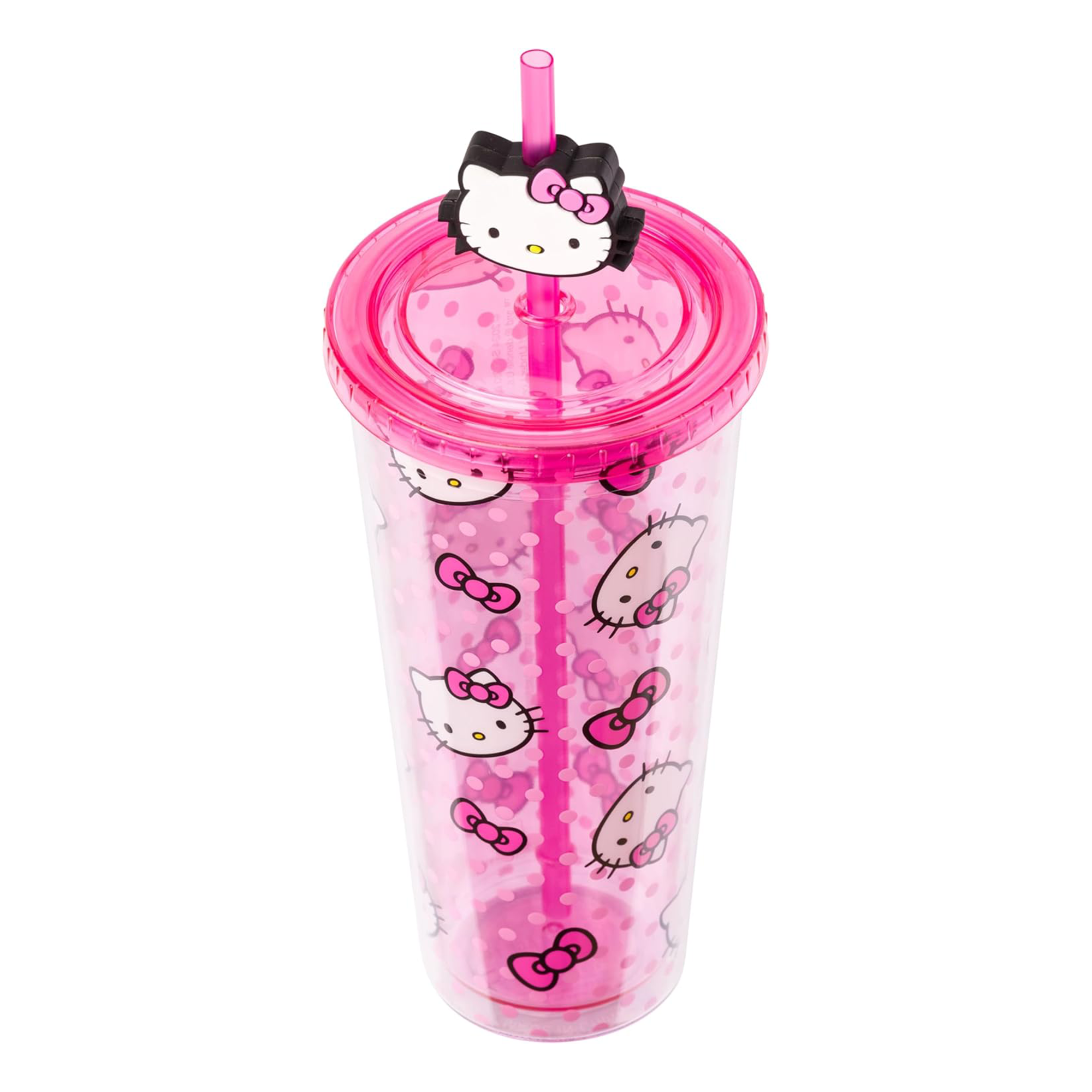 Close-up of 24oz tumbler with dots and bows on café table in Los Angeles