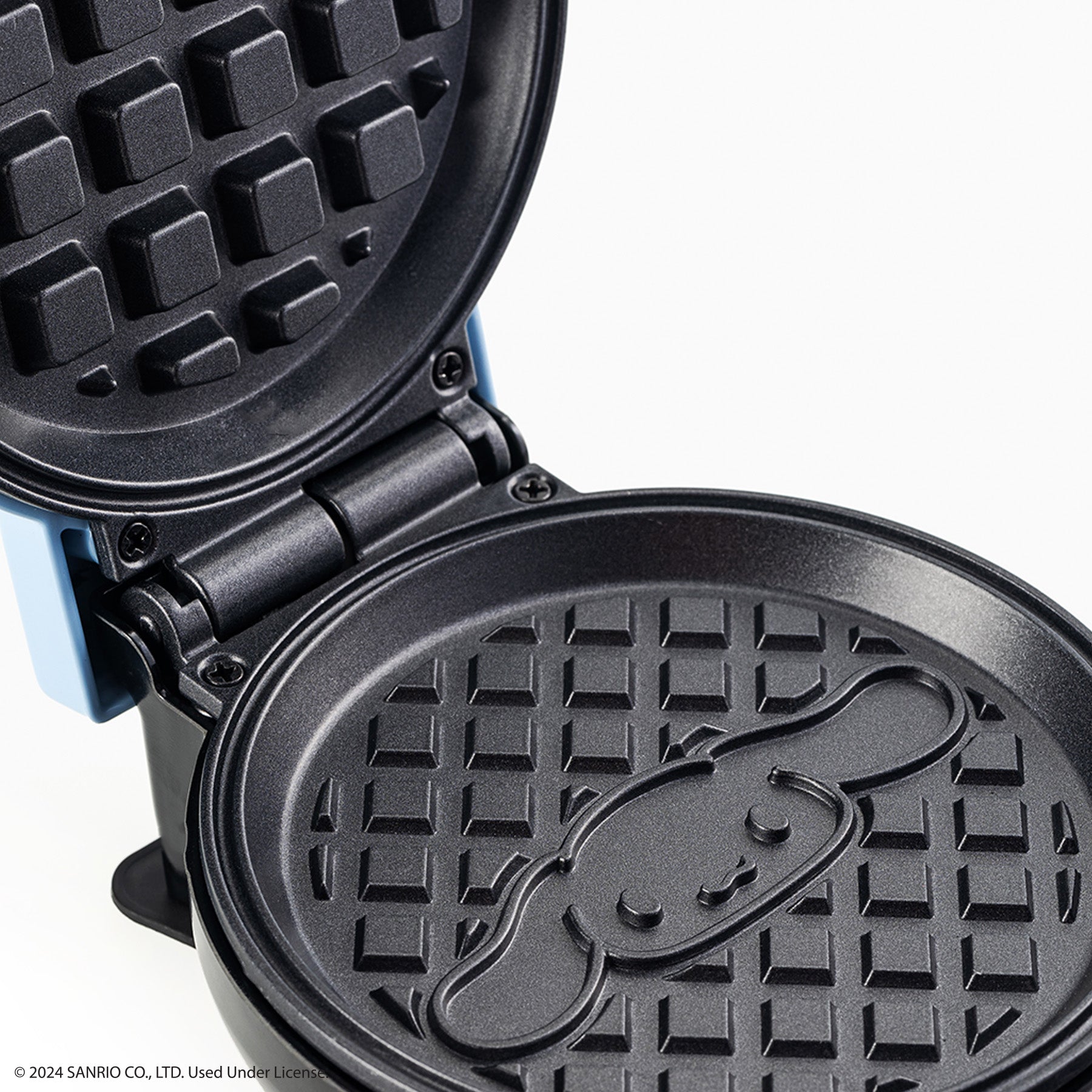 Dash Mini Waffle Maker with Cinnamoroll design in use