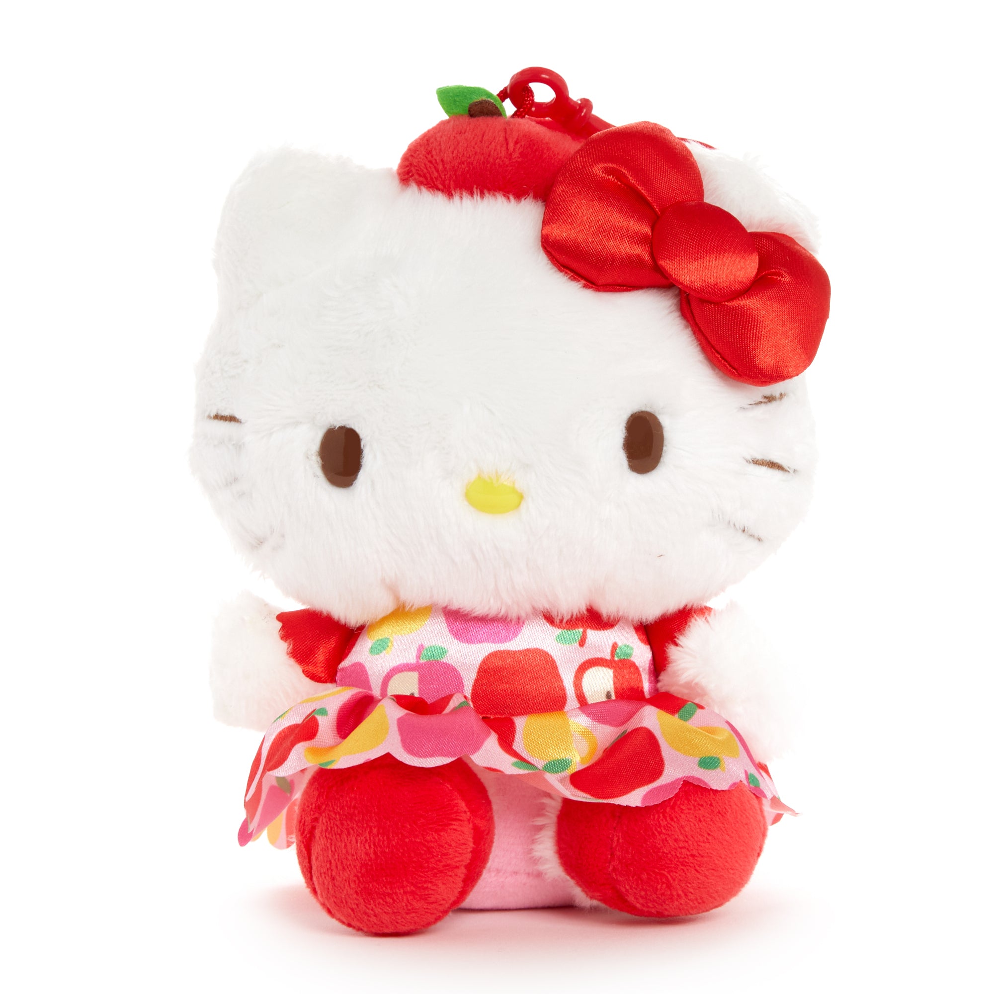 Hello Kitty plush clip mascot with apple hat accent and matching dress, front view