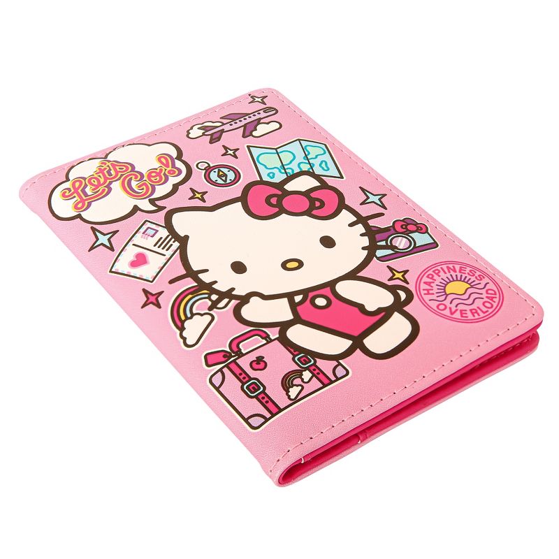 Close-up of Hello Kitty passport holder’s collage artwork and pink interior