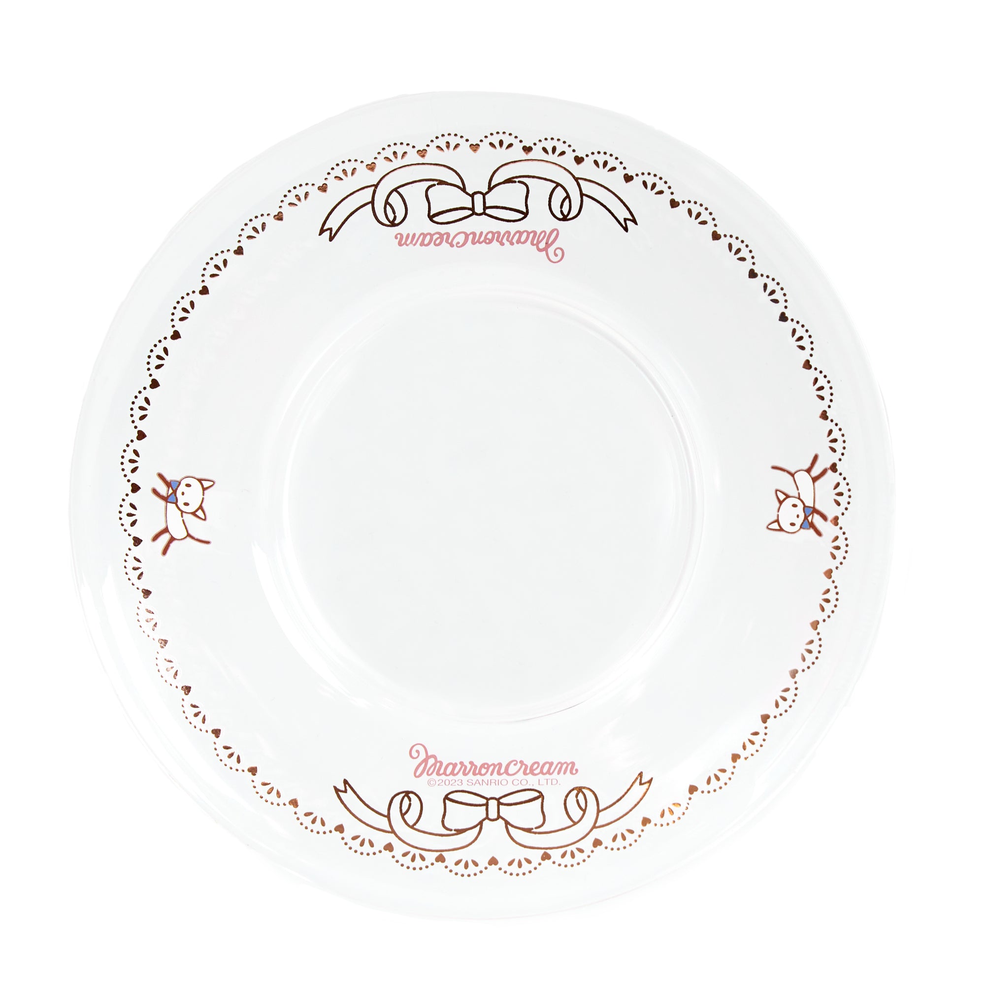 Close-up of the Marron Cream glass saucer set with decorative details.