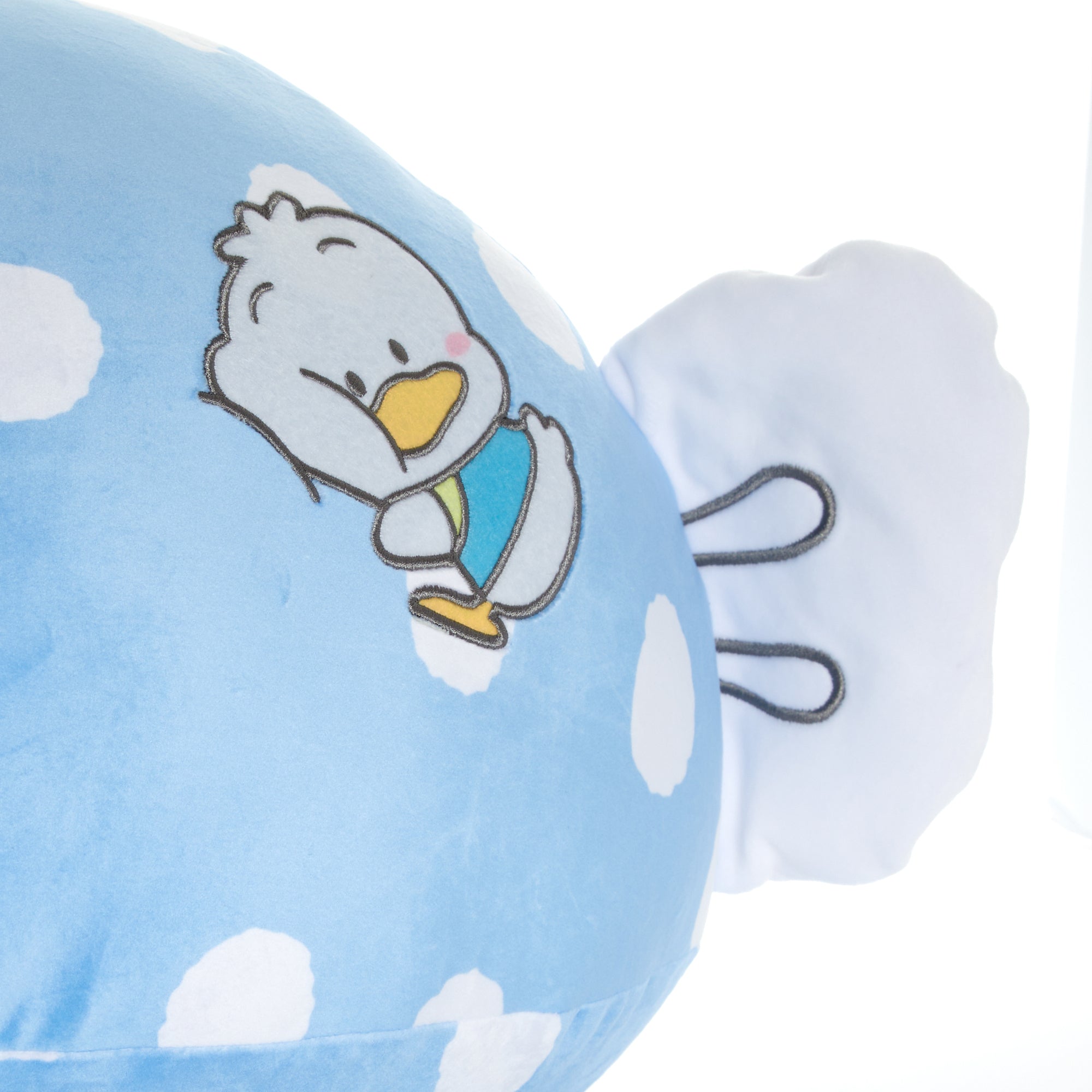 Pekkle Kids Throw Pillow displayed in a cozy reading nook, surrounded by Christmas throw pillows during the holiday season.
