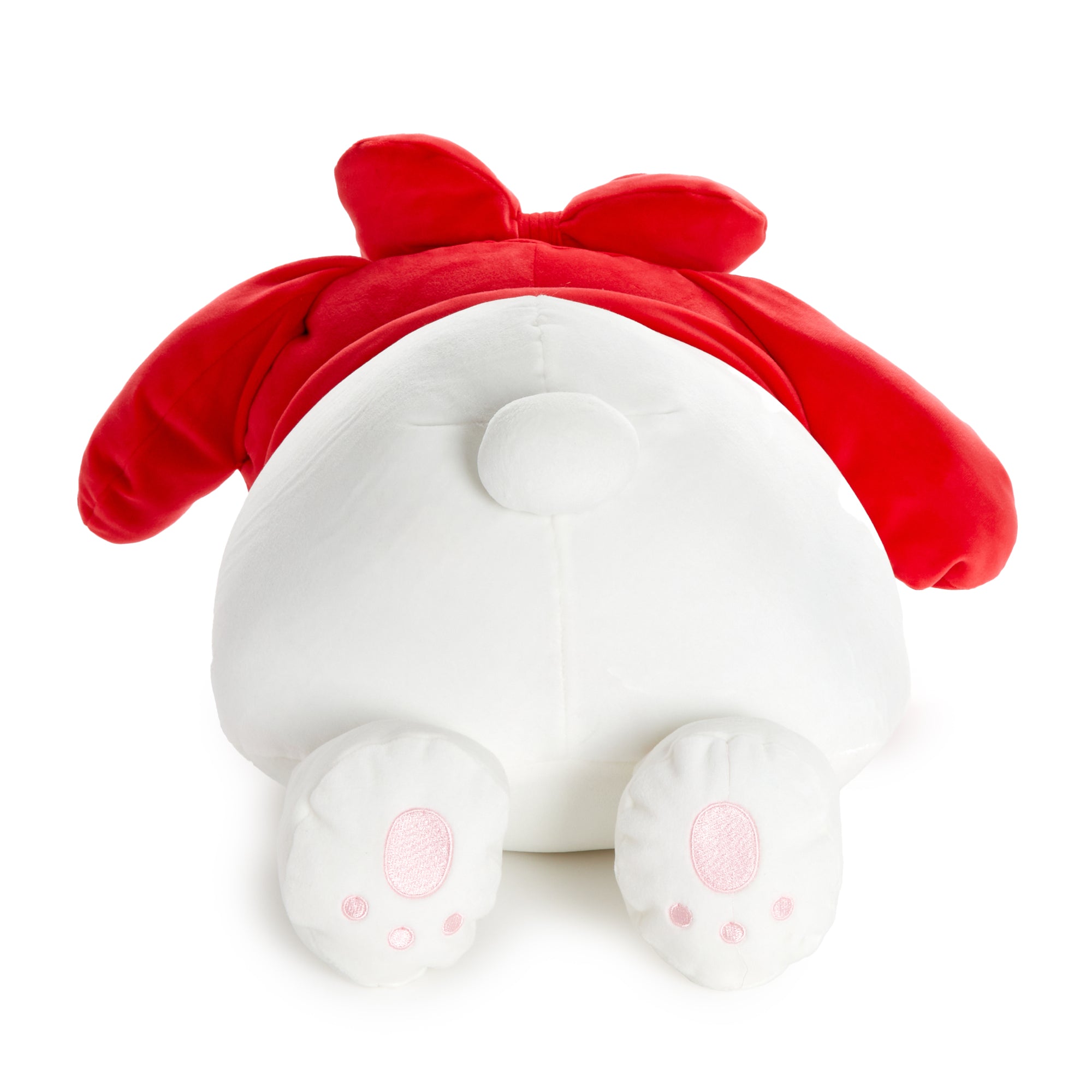 My Melody kawaii plush toy displayed on a cozy bed