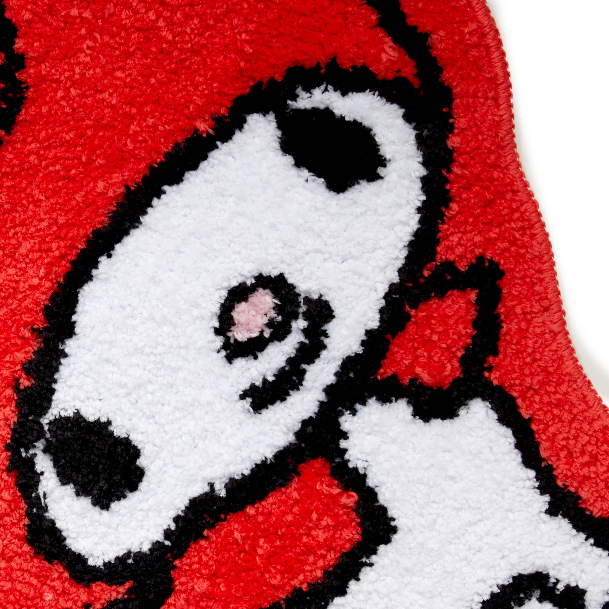 Close-up of the rugs binding detail and non-slip backing