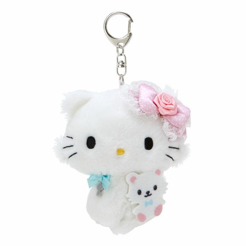 Close-up of Charmmy Kitty plush keychain, highlighting its soft texture and Sanrio design.
