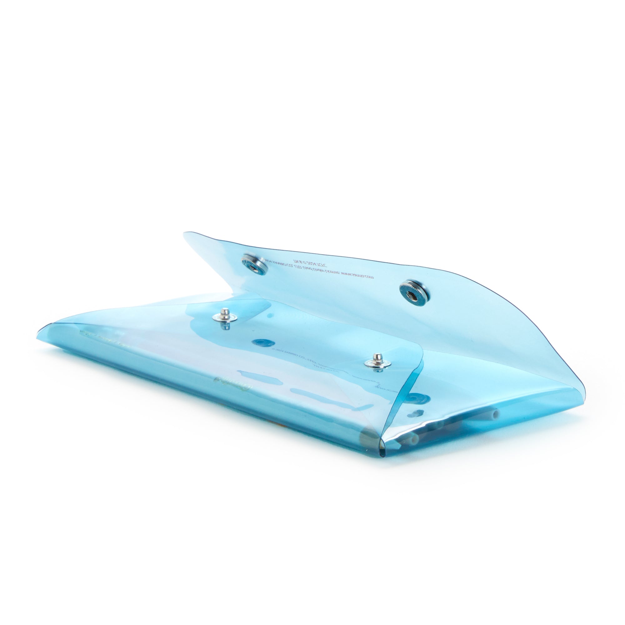 Open translucent pencil case showcasing school supplies inside.