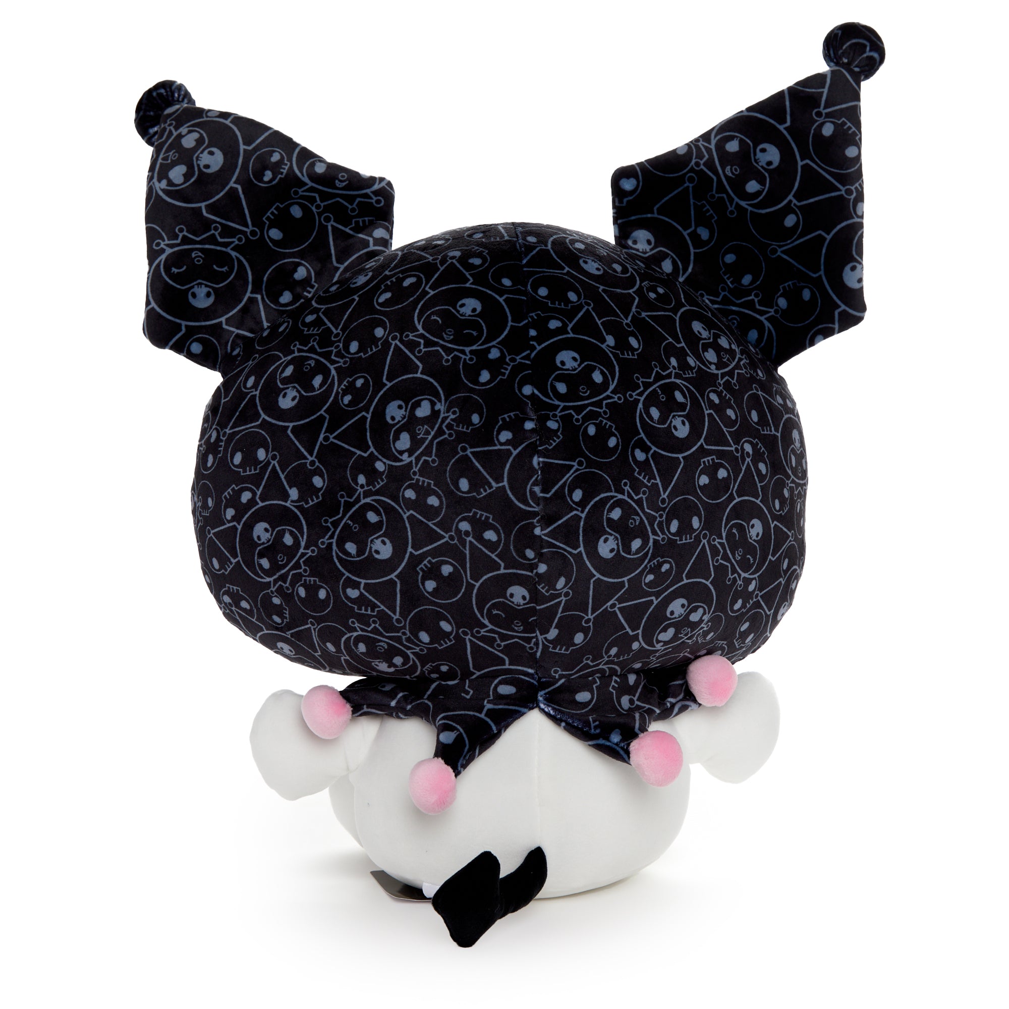 Kuromi plush toy sitting on a bed, showcasing its embroidered details