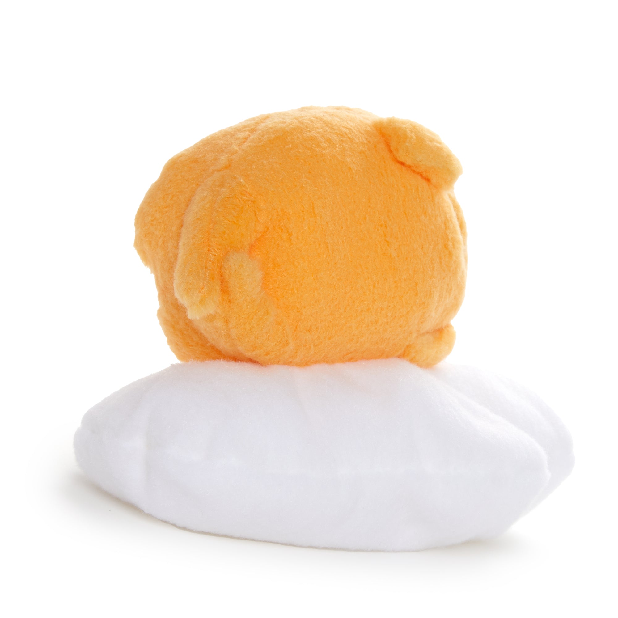 Close-up of the Gudetama plush dolls textured plush detailing and embroidered face.