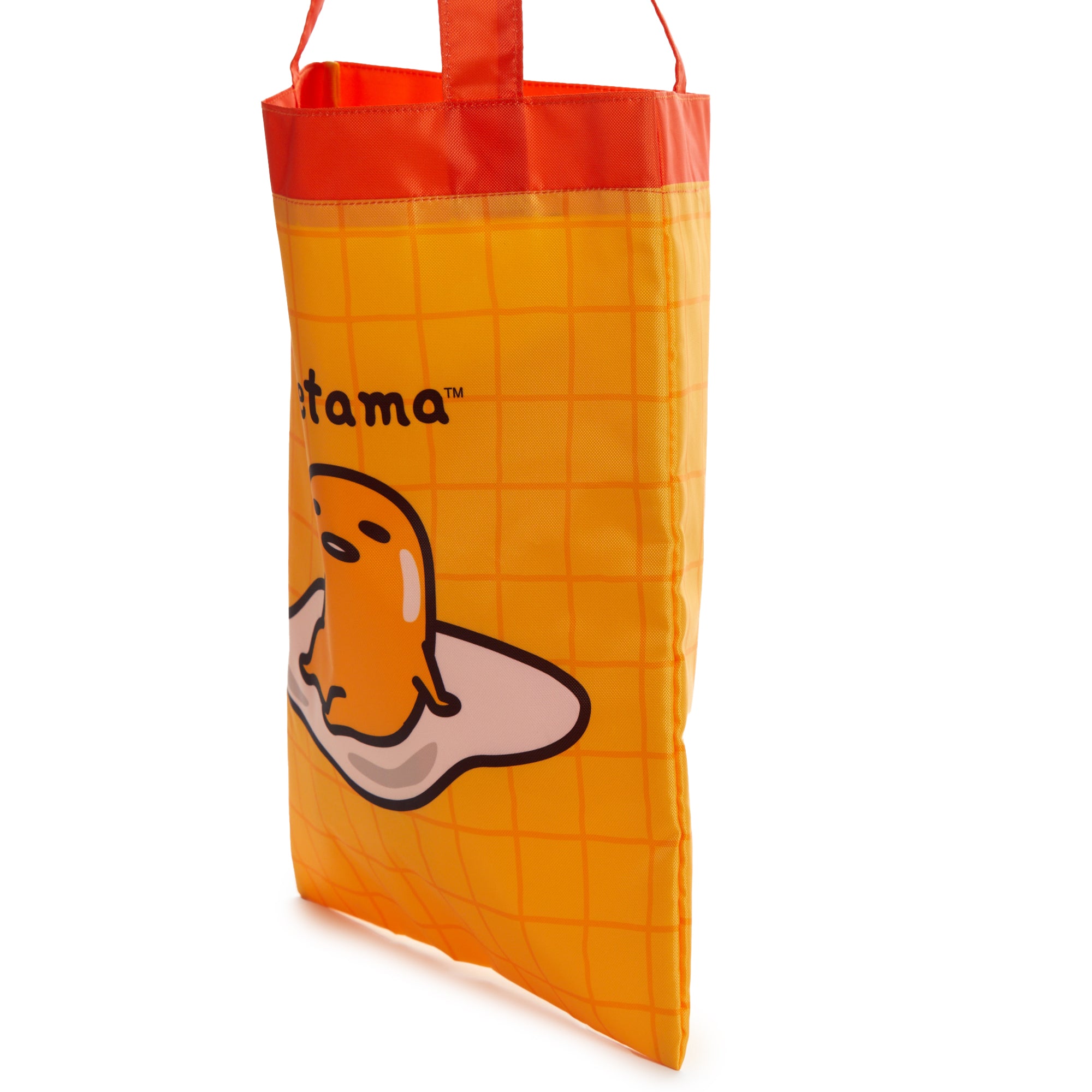 Gudetama tote bag held open, showing spacious interior pocket