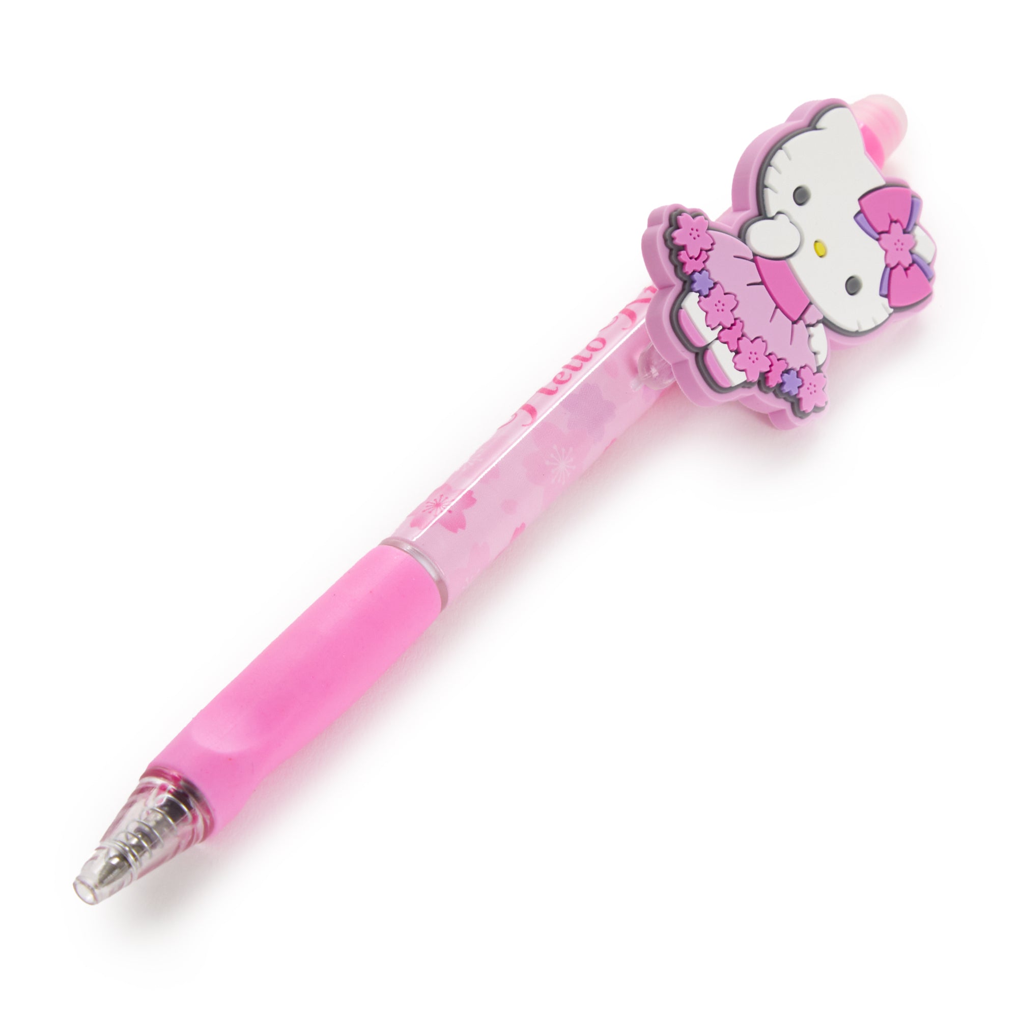 Close-up of Hello Kitty Sakura ballpoint pen on a desk, ideal for writing notes.