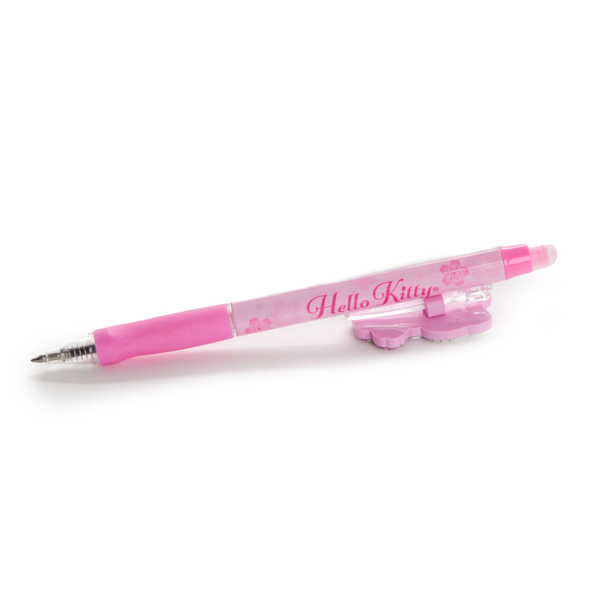 Hello Kitty pen with Sakura designs, showcased on a colorful notebook.