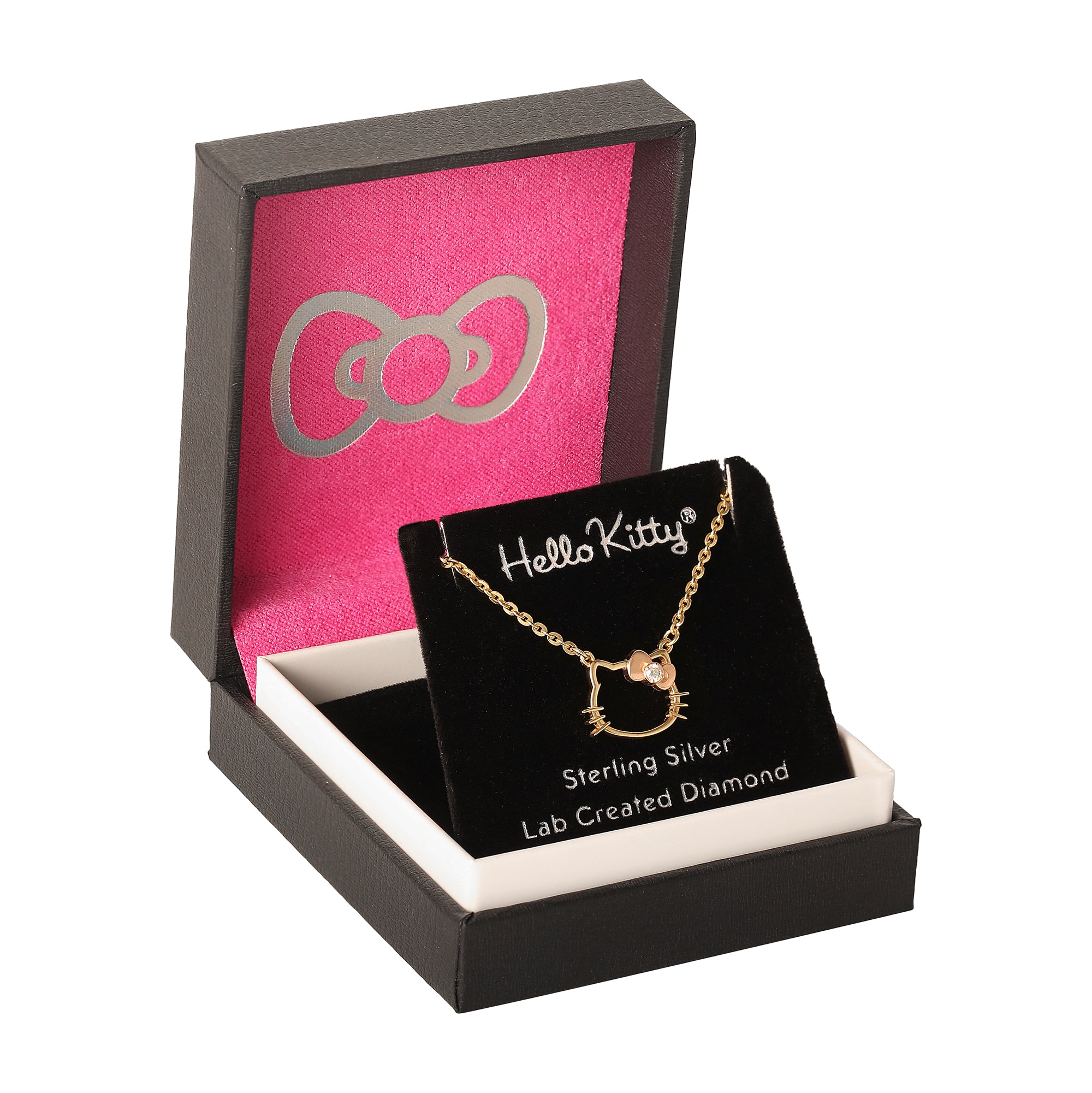 Side view of Hello Kitty pendant with diamond accent, showcasing rose gold details.