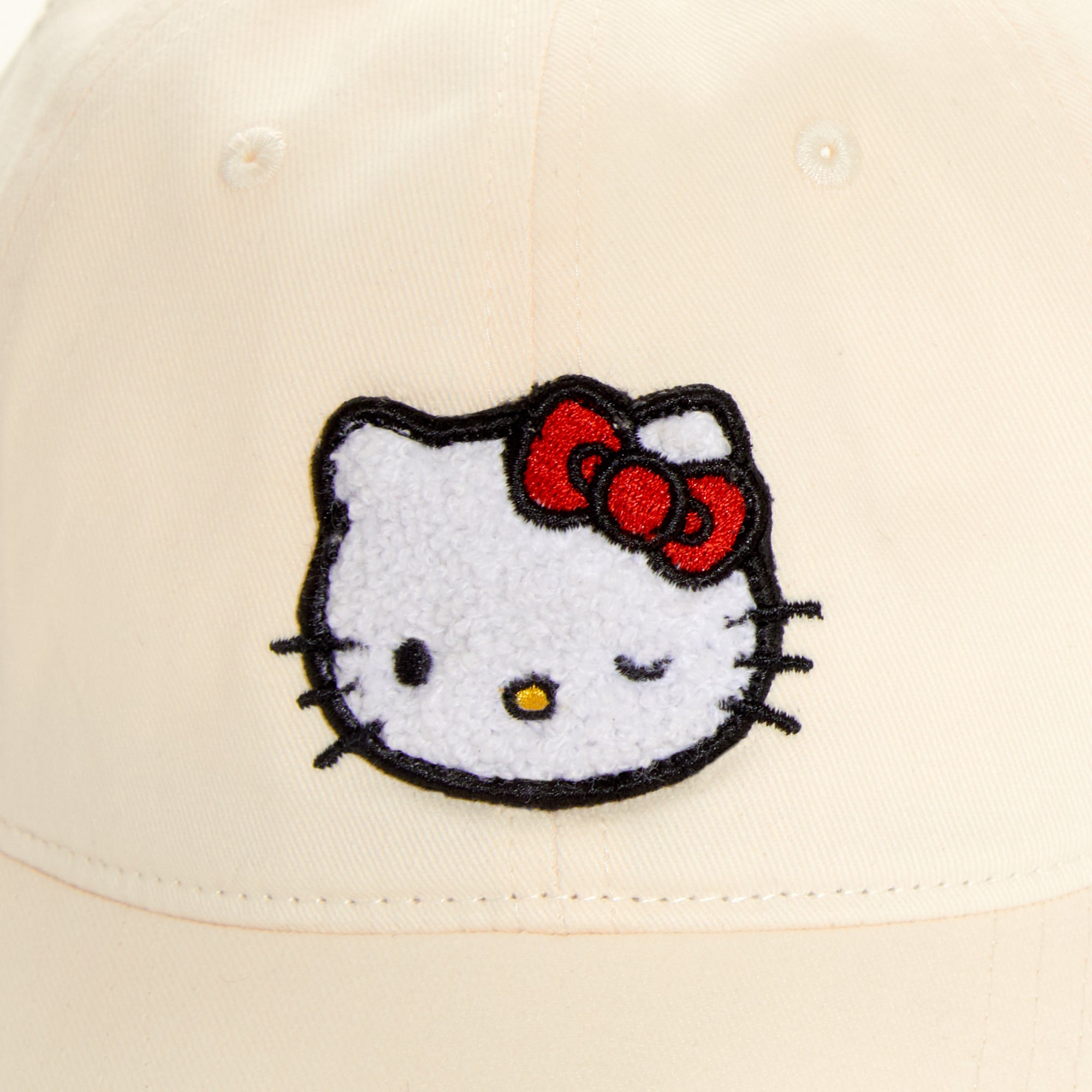 Side profile of adjustable hello kitty scrub cap showing strap back