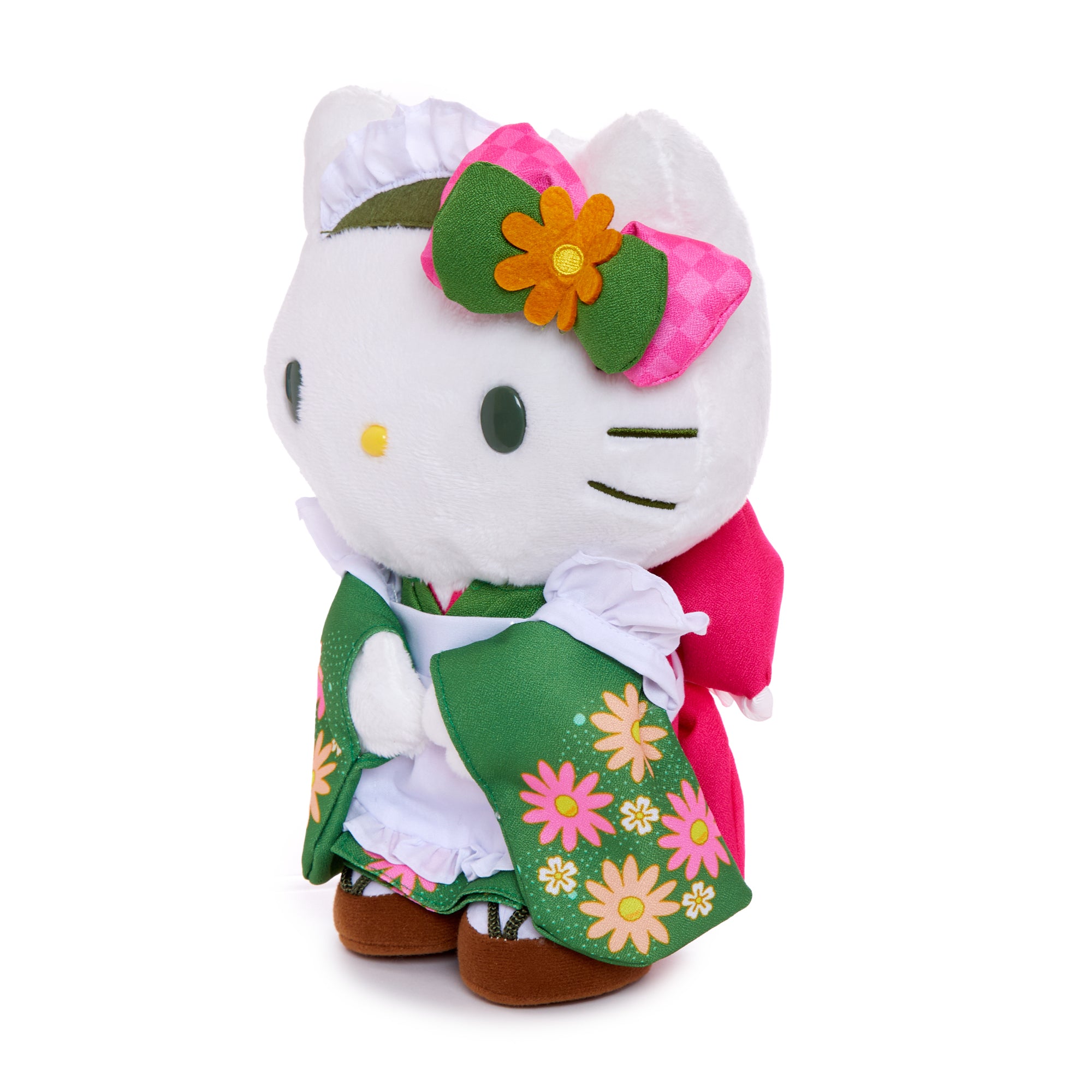 Close-up of Hello Kitty plush showing embroidered details and contrasting back bow