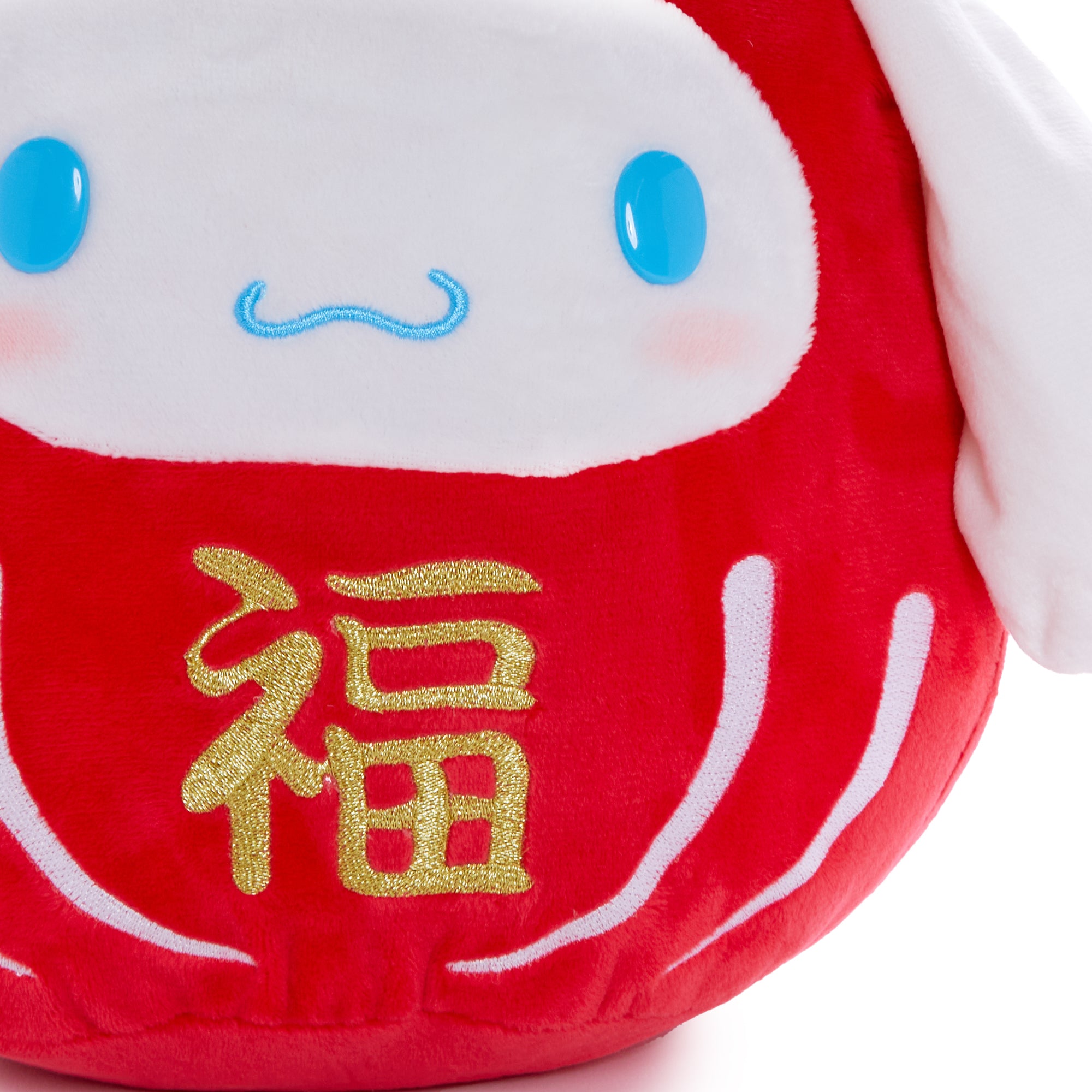 Cinnamoroll Daruma plush toy being hugged, showcasing its cuddly nature
