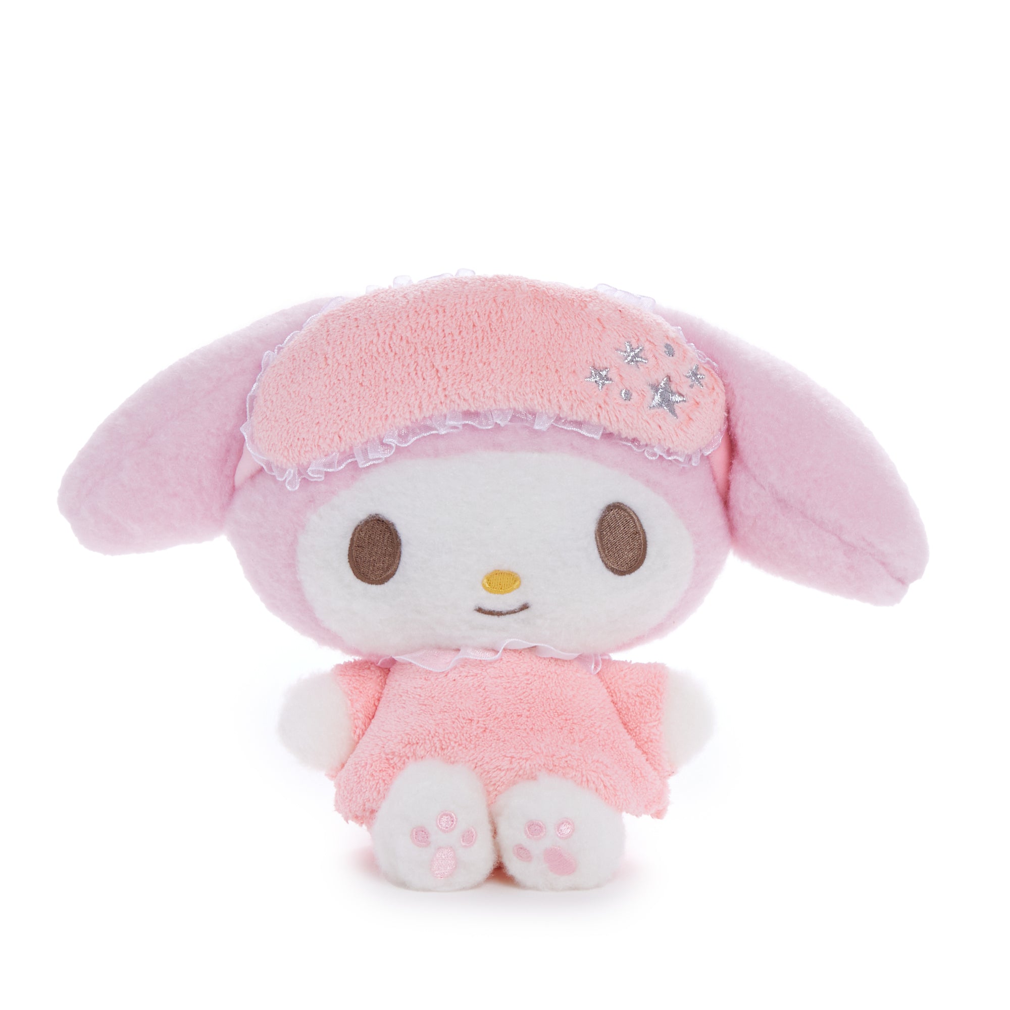 Front view of My Melody plush toy in pajamas on a bedside table