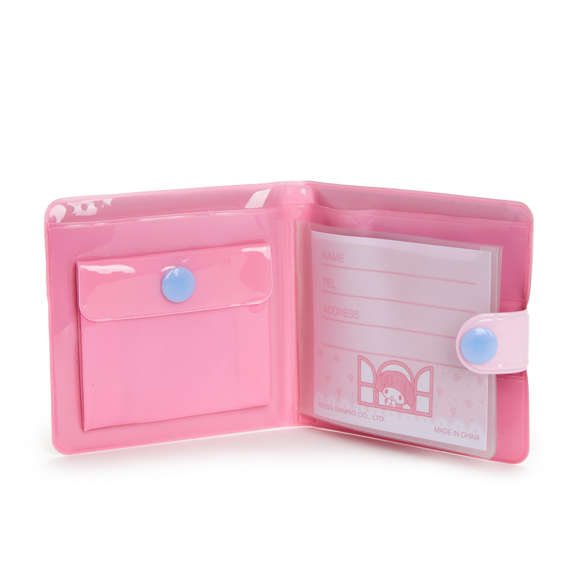Open wallet displaying card pockets and clear ID slots with soft vinyl sheen