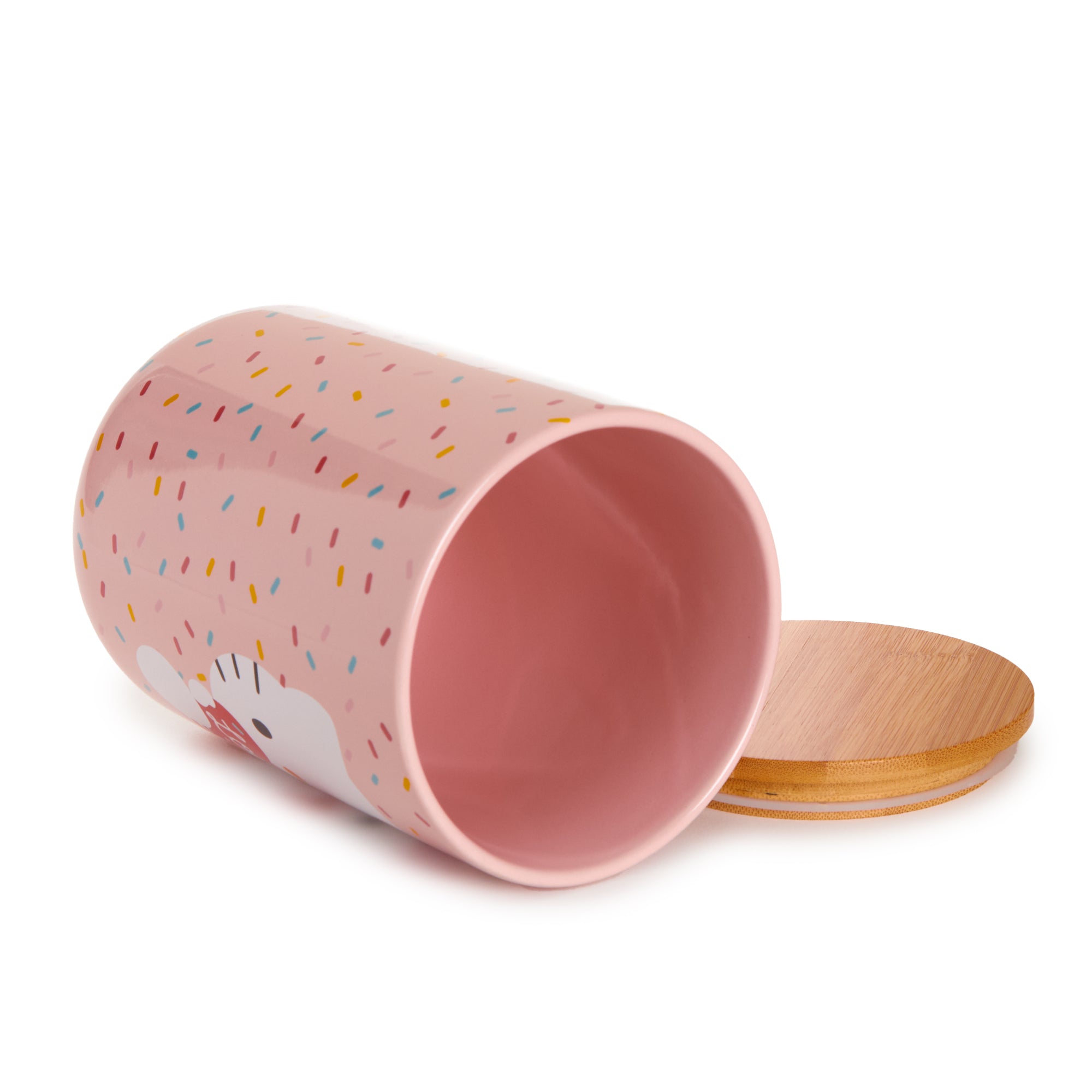 Stacked cookies inside the Hello Kitty cookie jar, showcasing its adorable design