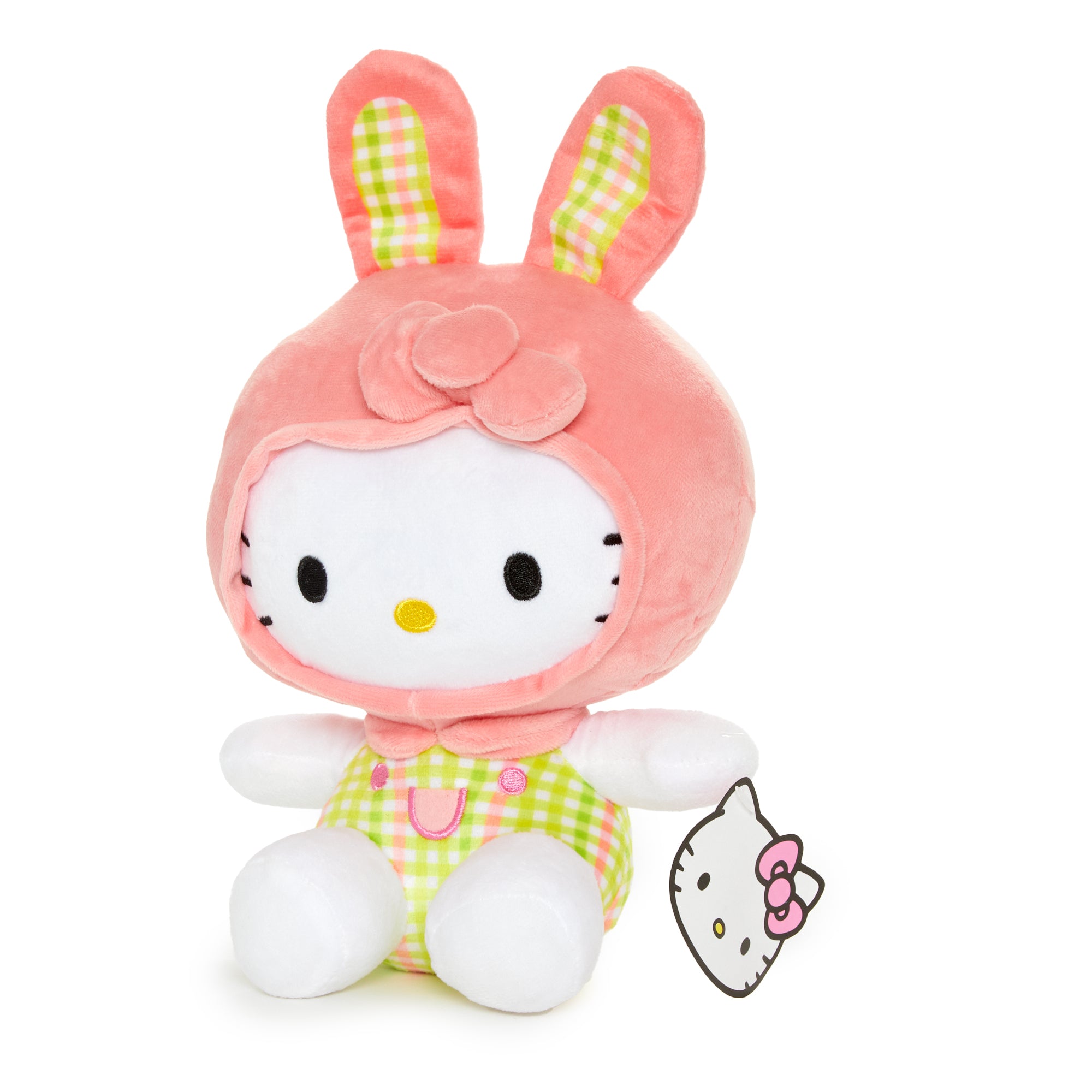 Close-up of Hello Kitty bunny plushs embroidered face and plaid ear accents.