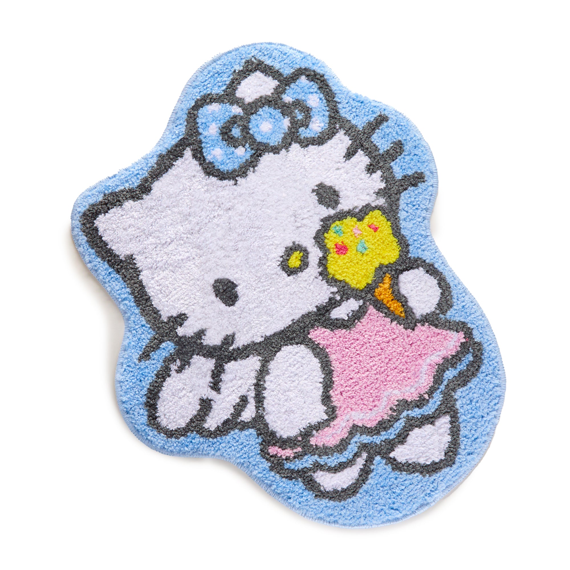 Hello Kitty Rug with colorful ice cream print, placed in a child’s bedroom