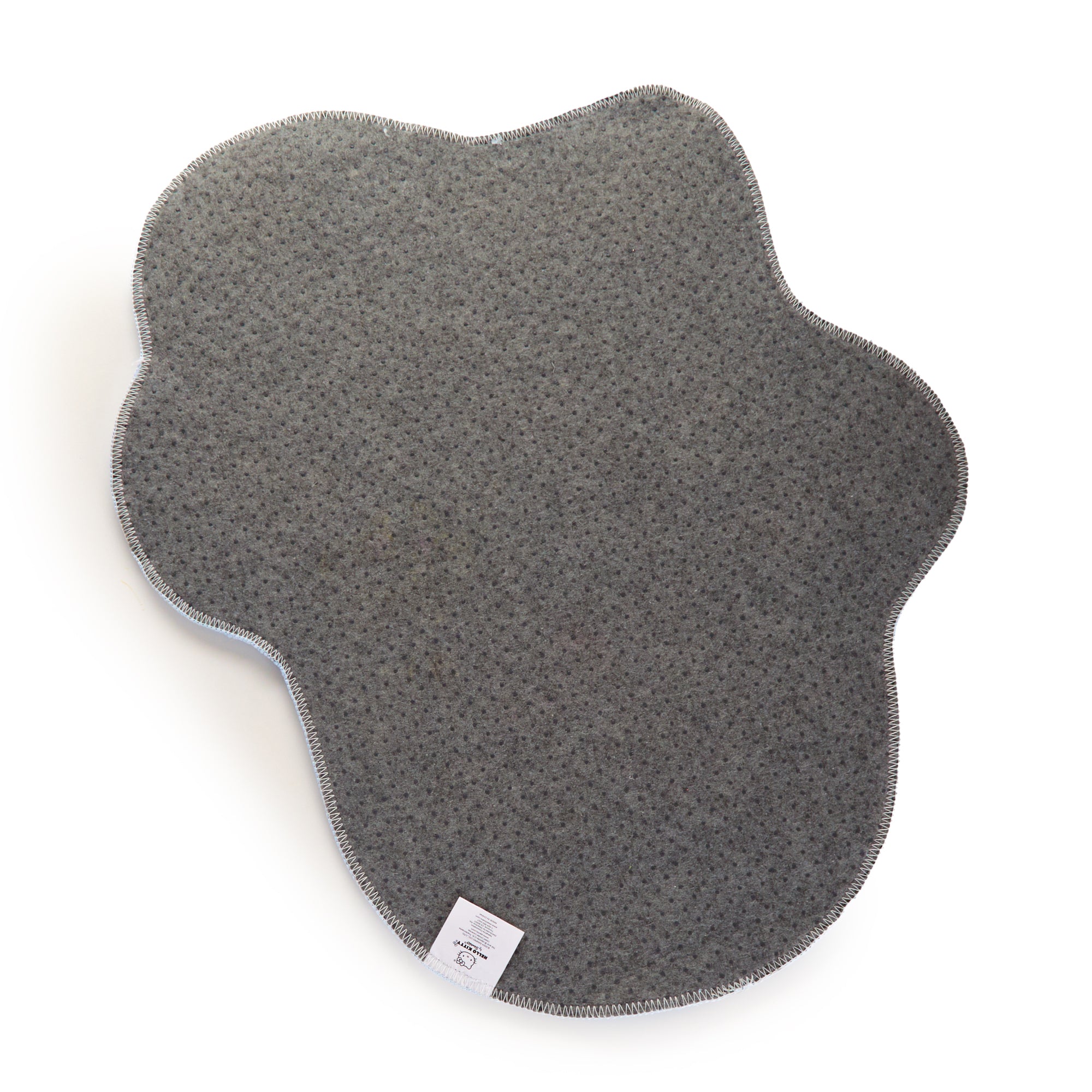Close-up of the accent rug’s durable binding and soft texture