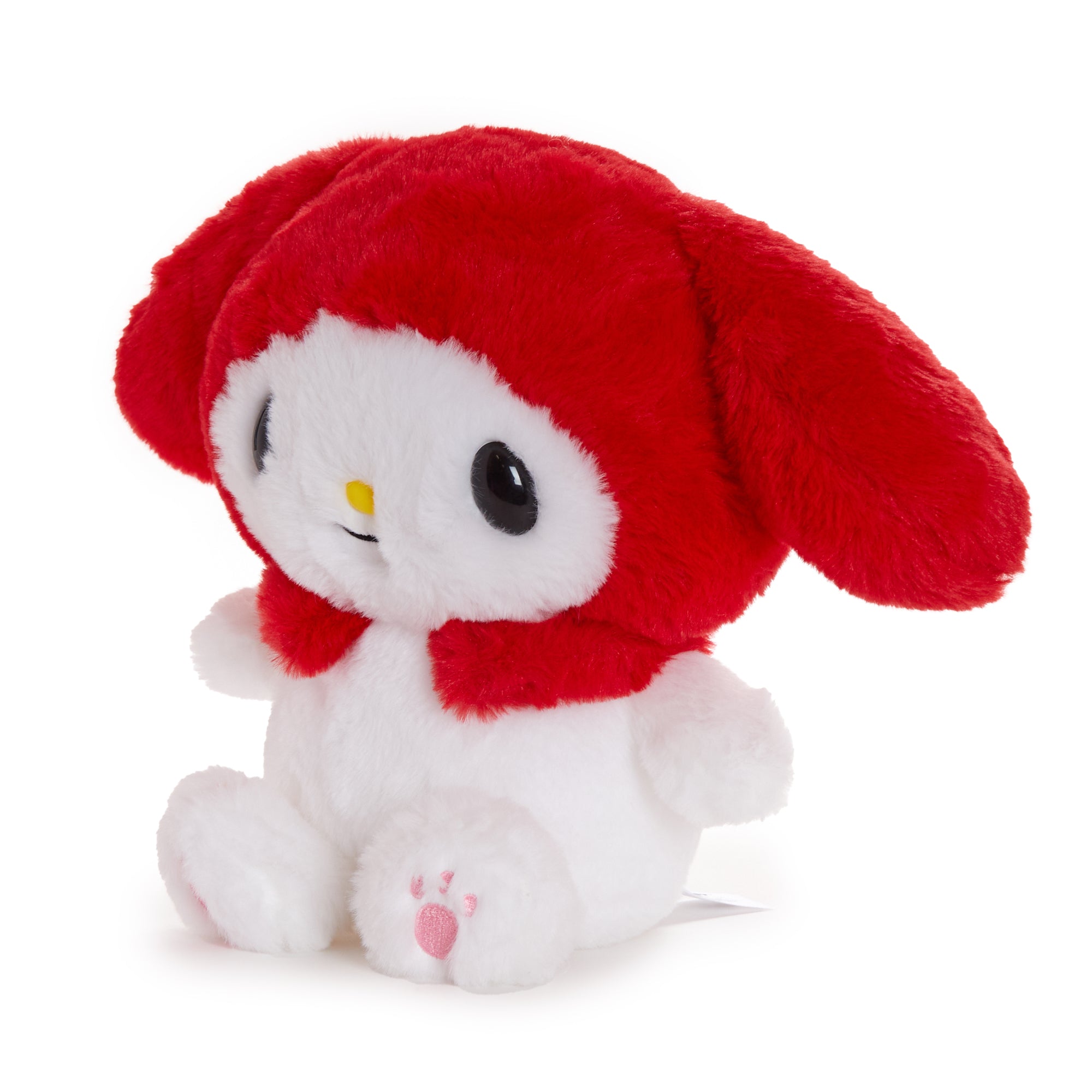 My Melody plush toy sitting beside a laptop, ideal for home or office decor.
