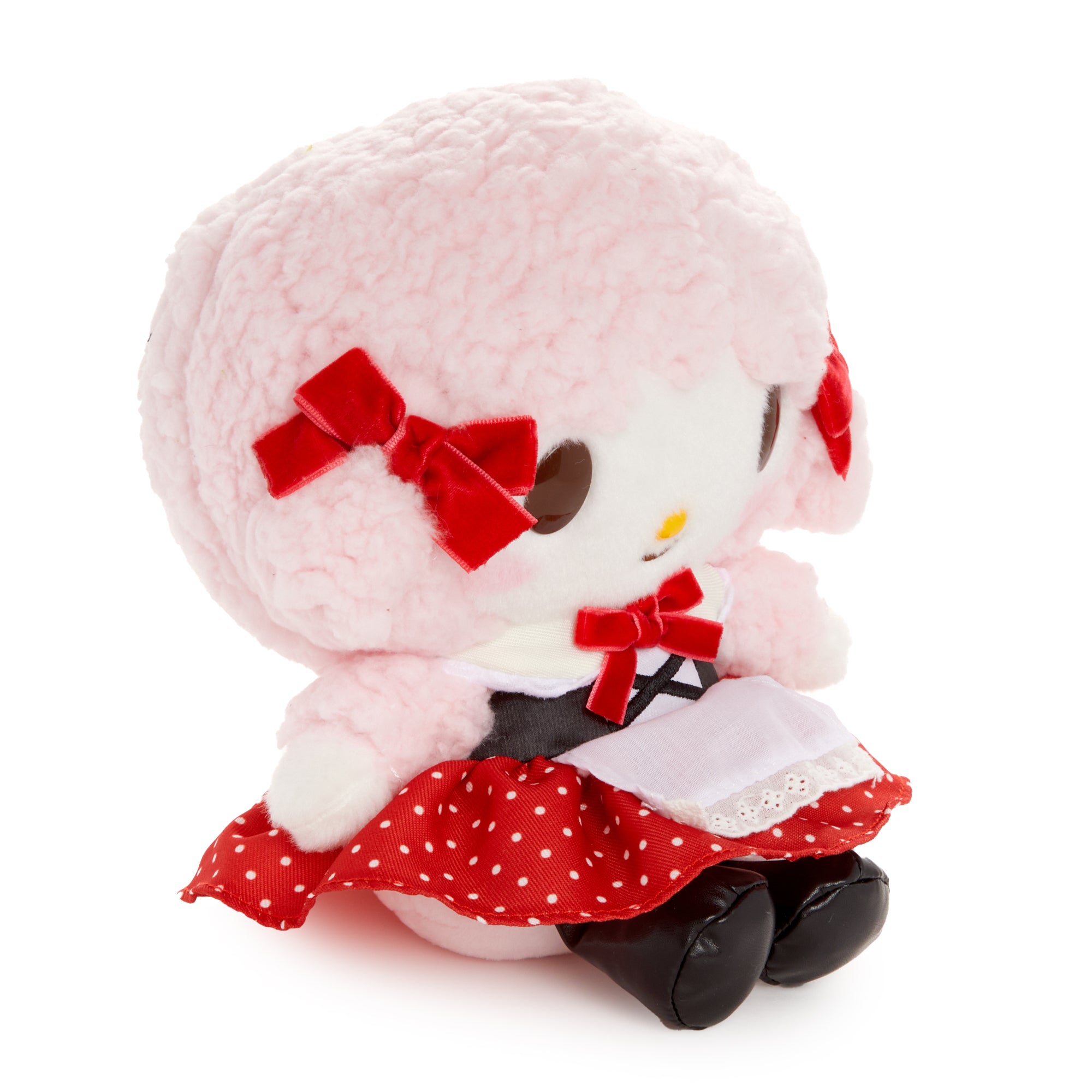 Retro plush piano with polka dots and velvet ribbons, front view