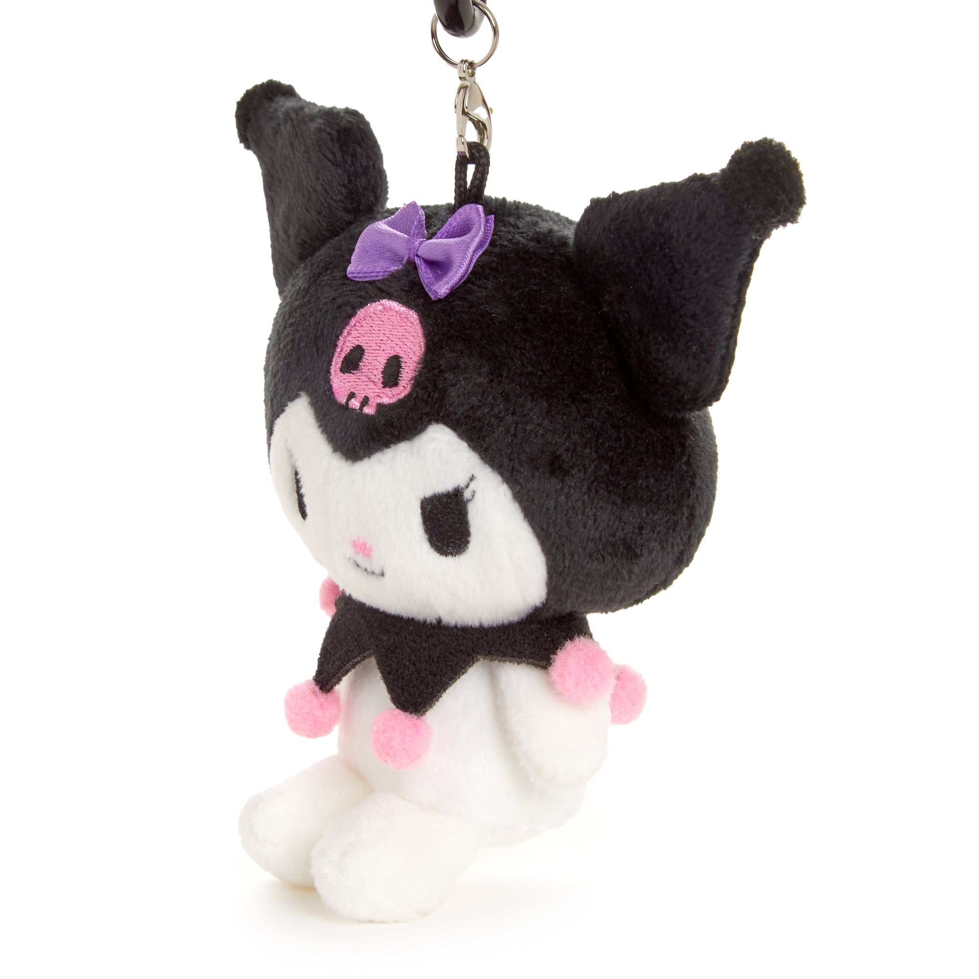 Kuromi plush keychain on a backpack strap, showing its durability