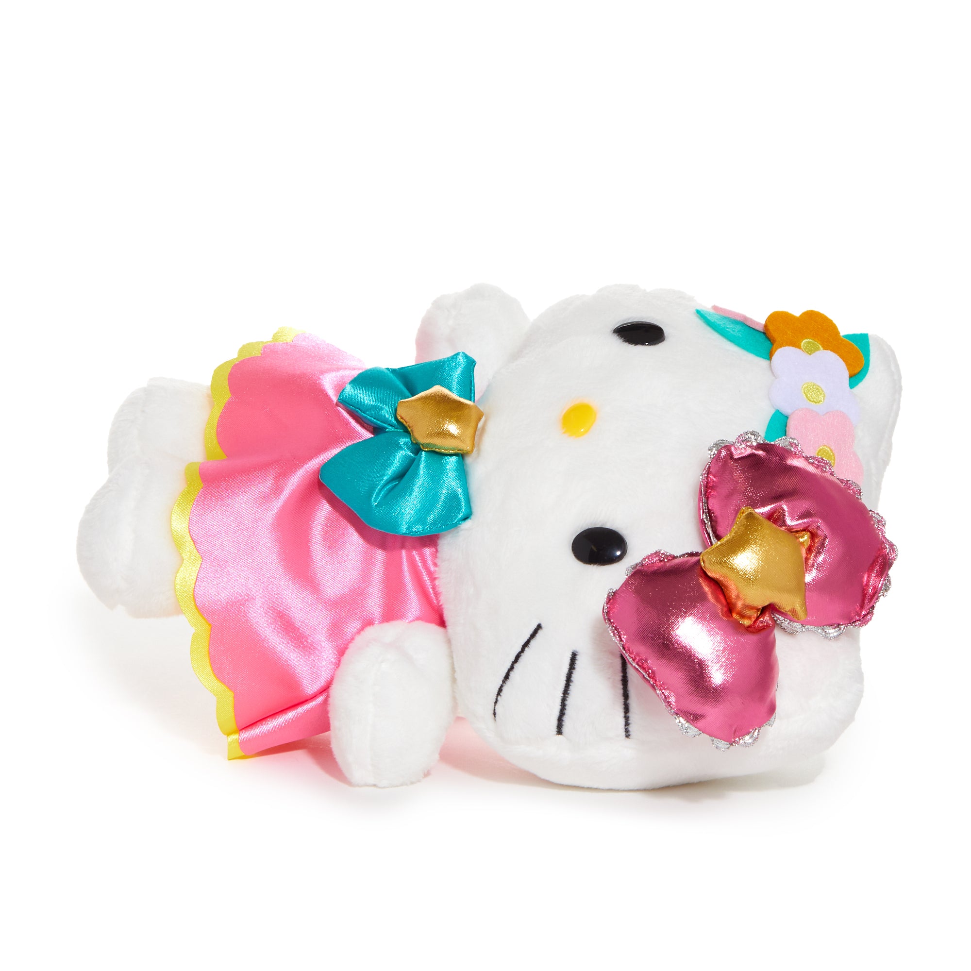 Hello Kitty astrology plush alongside a celestial-themed notebook