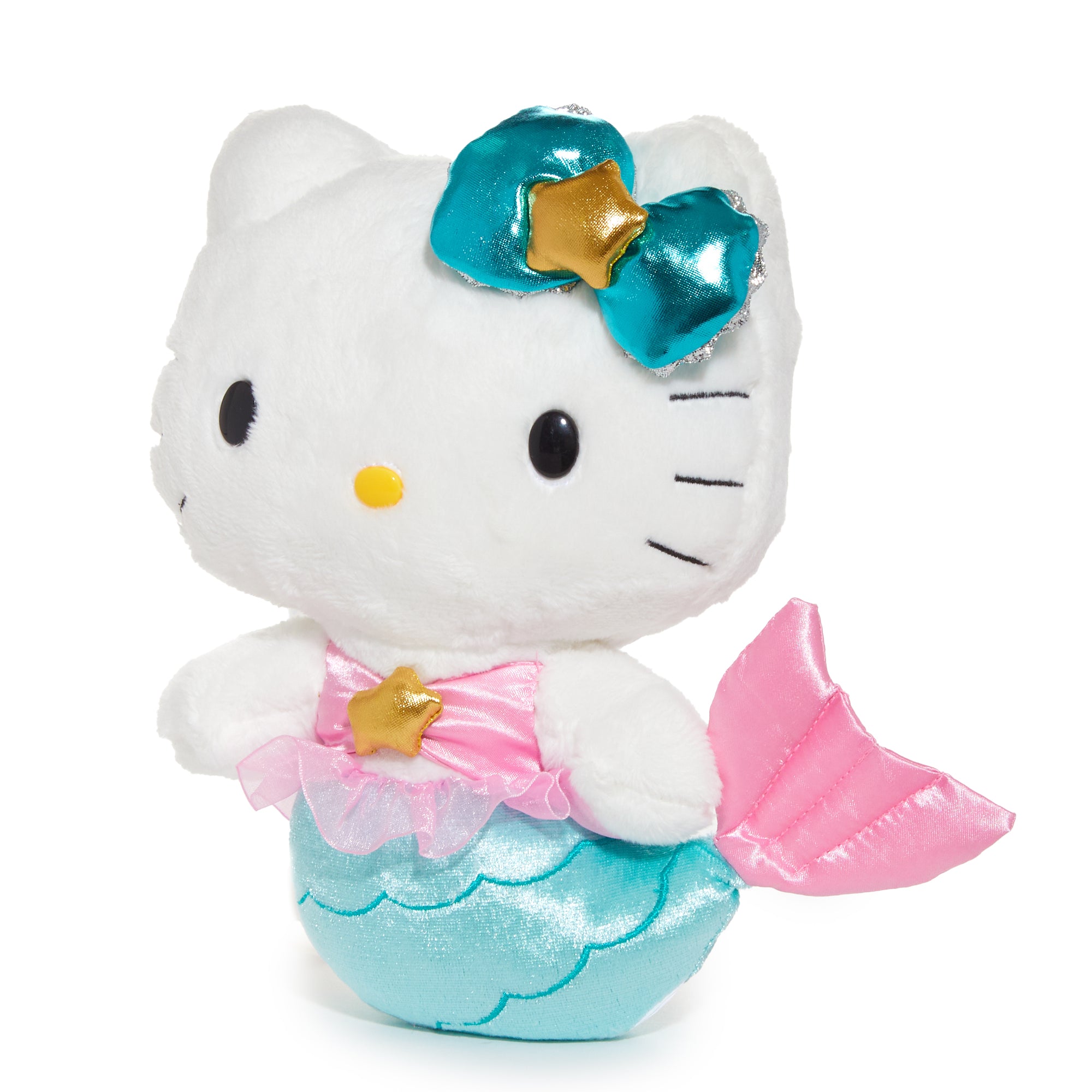 Side view of Hello Kitty zodiac plush sitting on bookshelf in a cozy Missouri bedroom